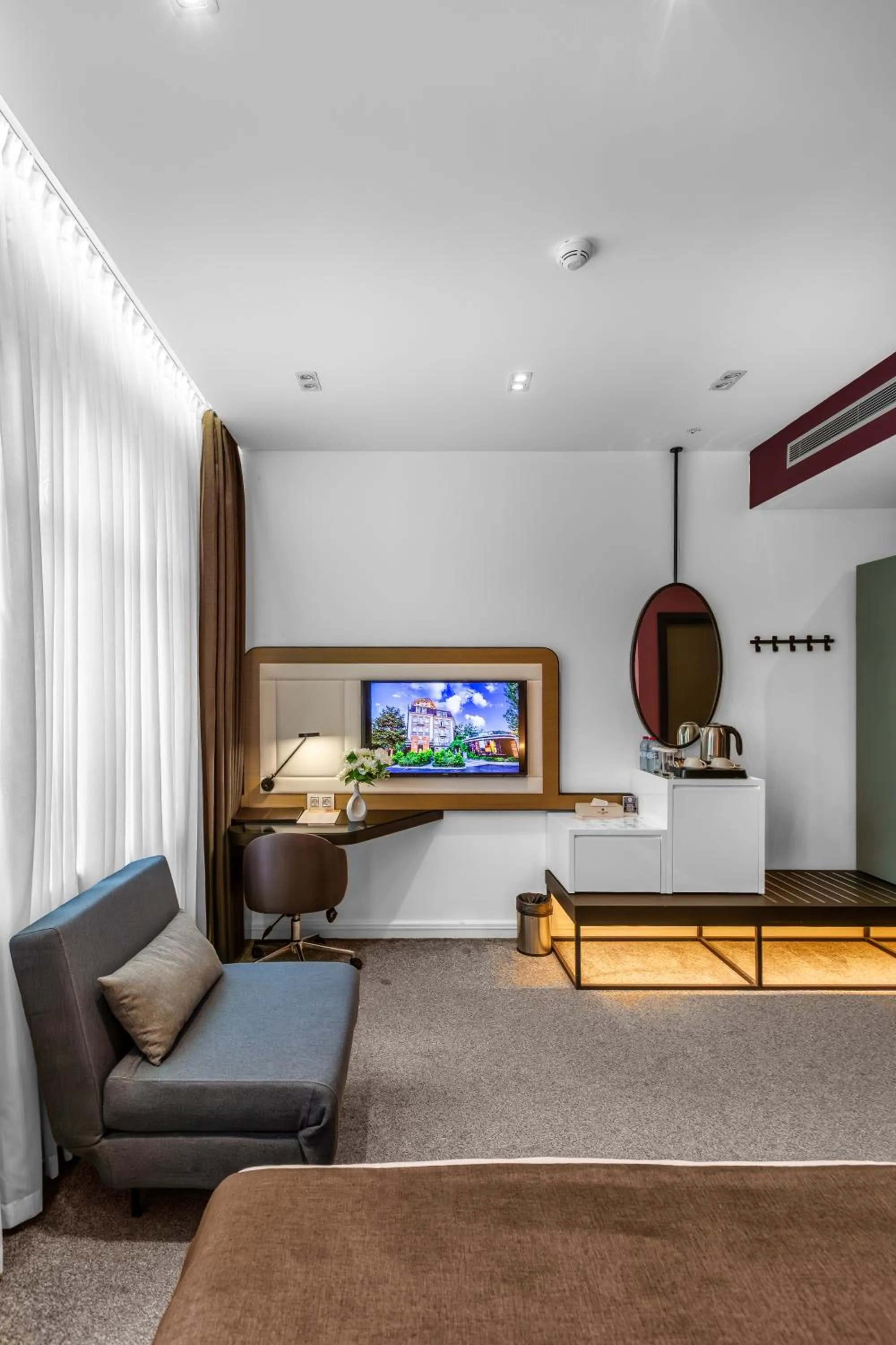 Communal lounge/ TV room, Bed in Ivy Garden Hotel Baku