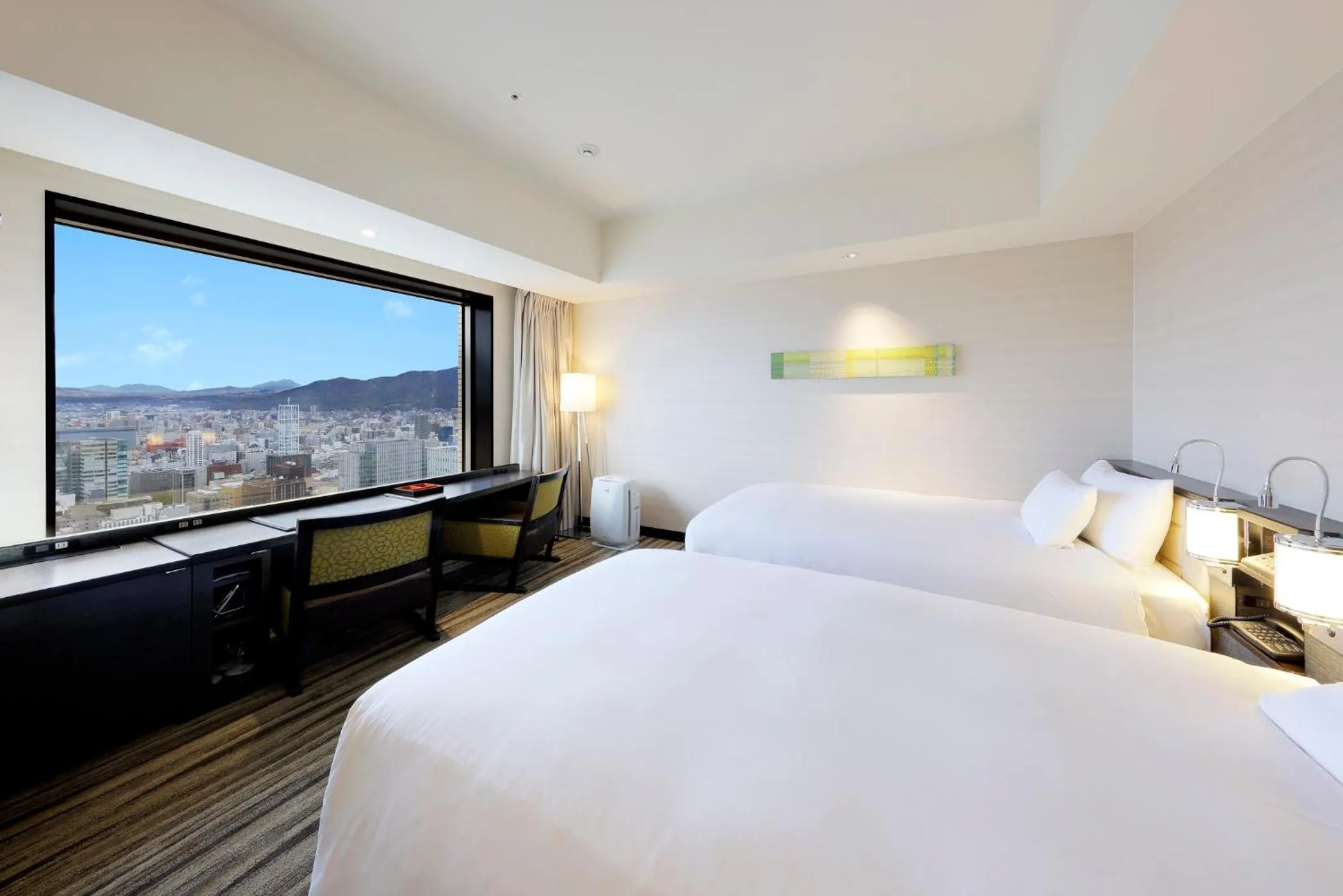 Photo of the whole room, Bed in JR Tower Hotel Nikko Sapporo