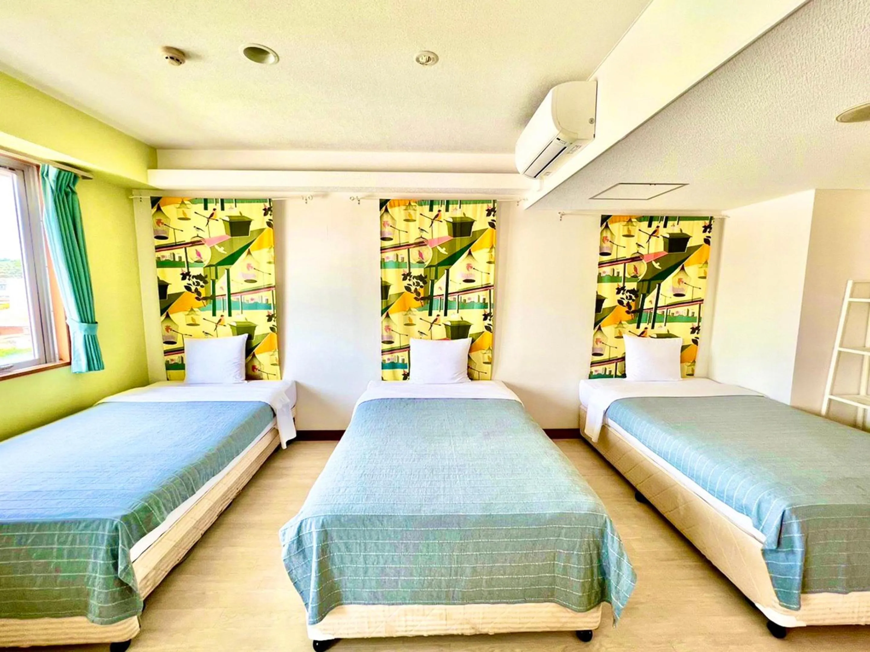 Bedroom, Bed in Hotel Happy Holiday Ishigaki