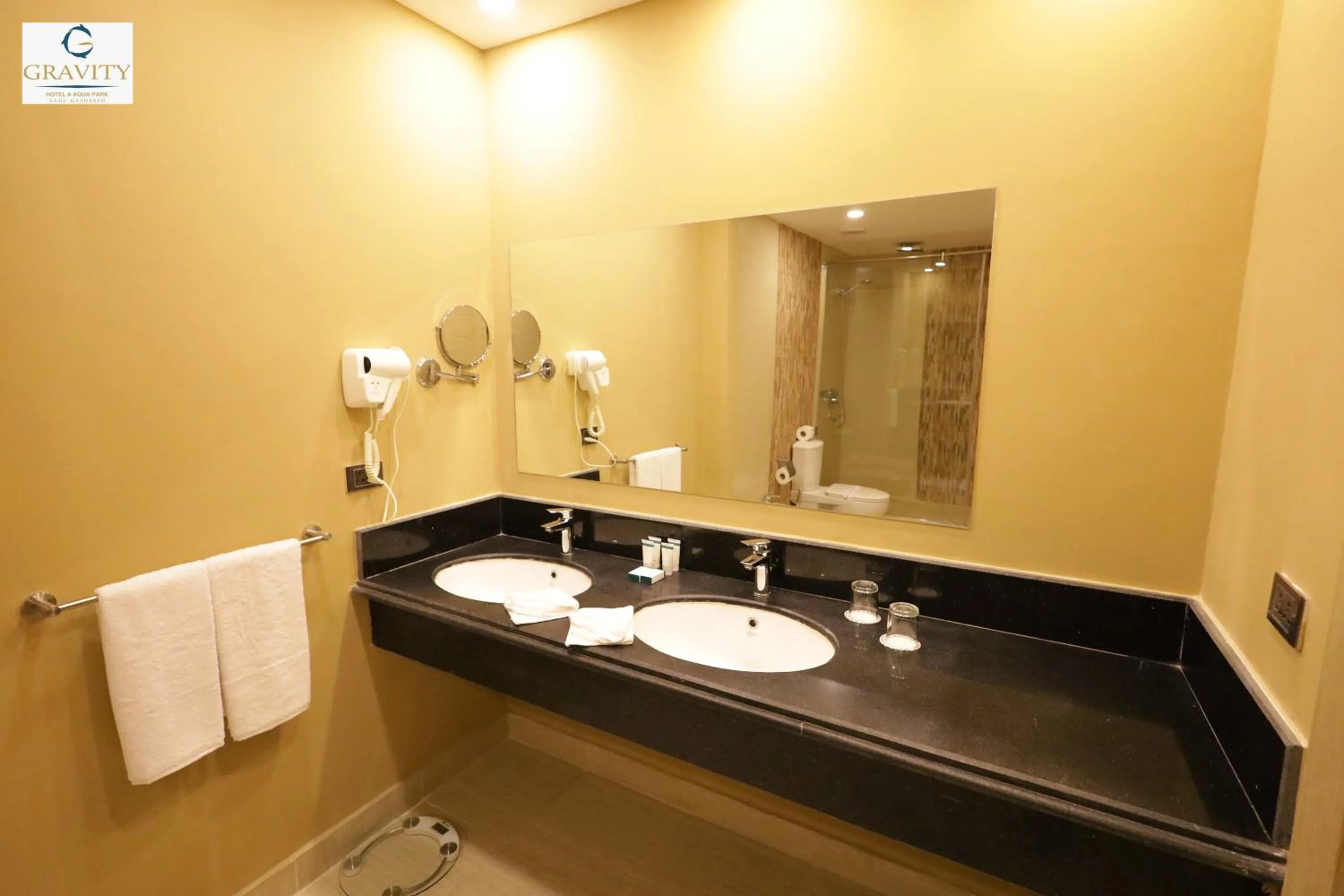 Toilet in Gravity Hotel & Aqua Park Sahl Hasheesh Families and Couples Only