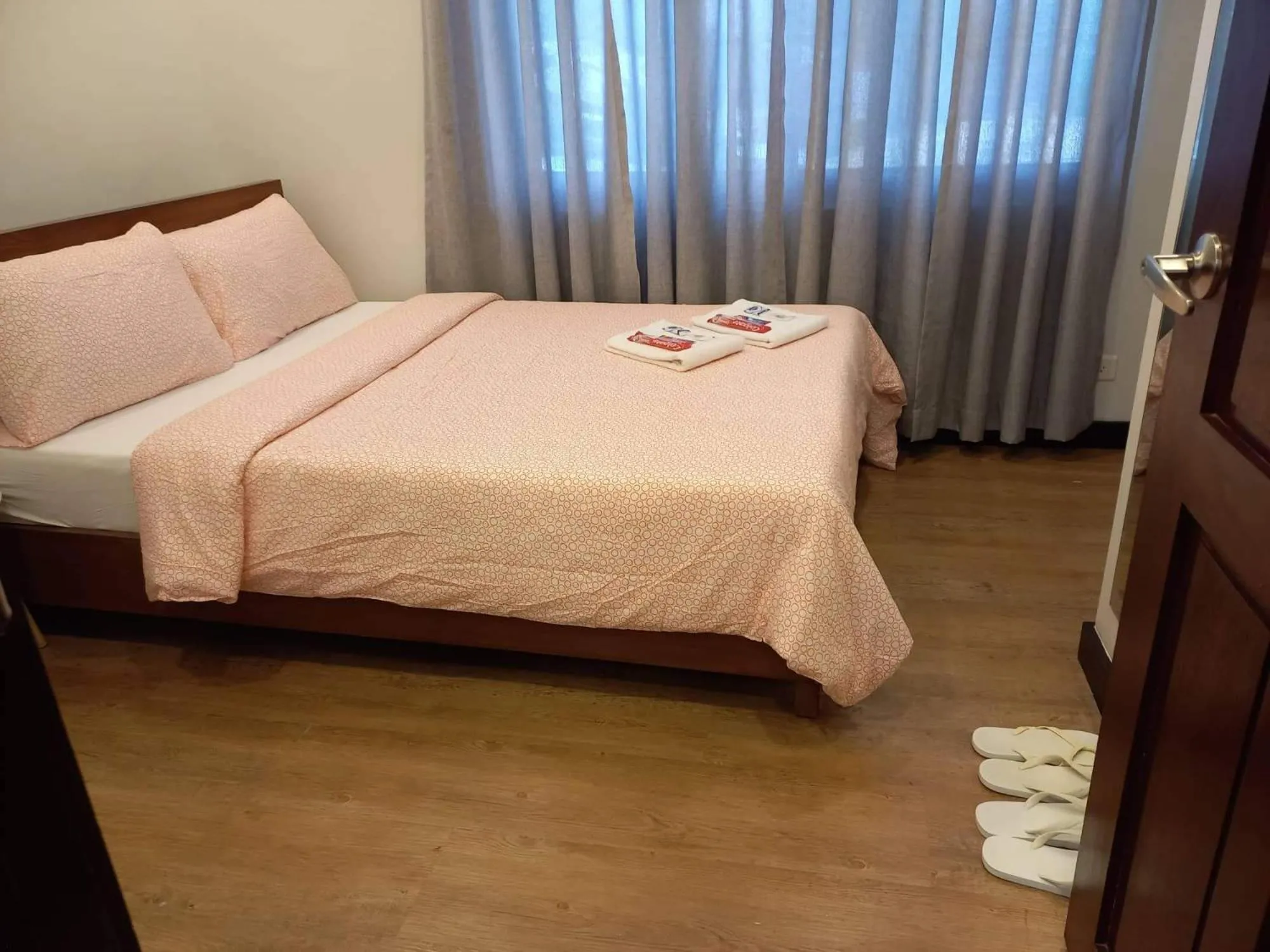 Photo of the whole room, Bed in GLC SUITES