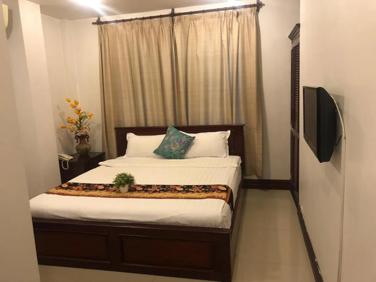 Bed in Vientiane SP Hotel