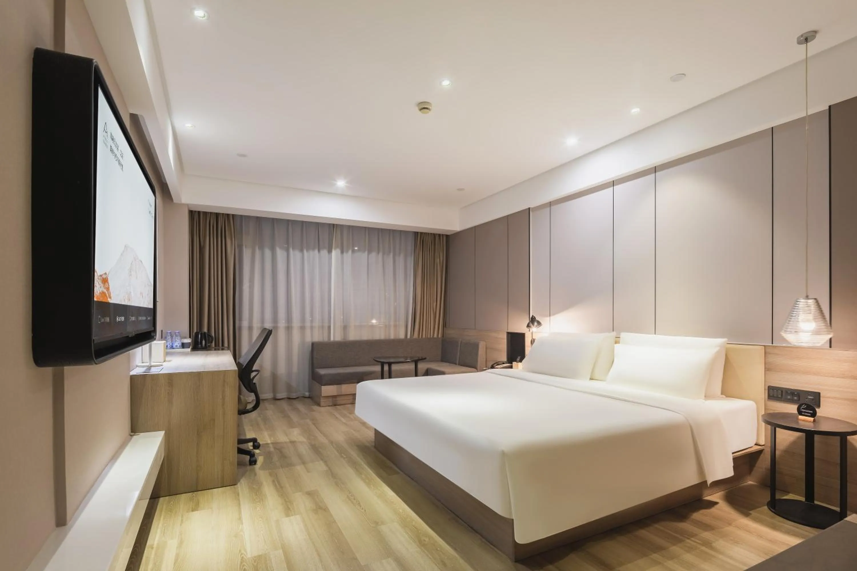 Photo of the whole room, Bed in Atour Jiaozhou Qingdao Hotel