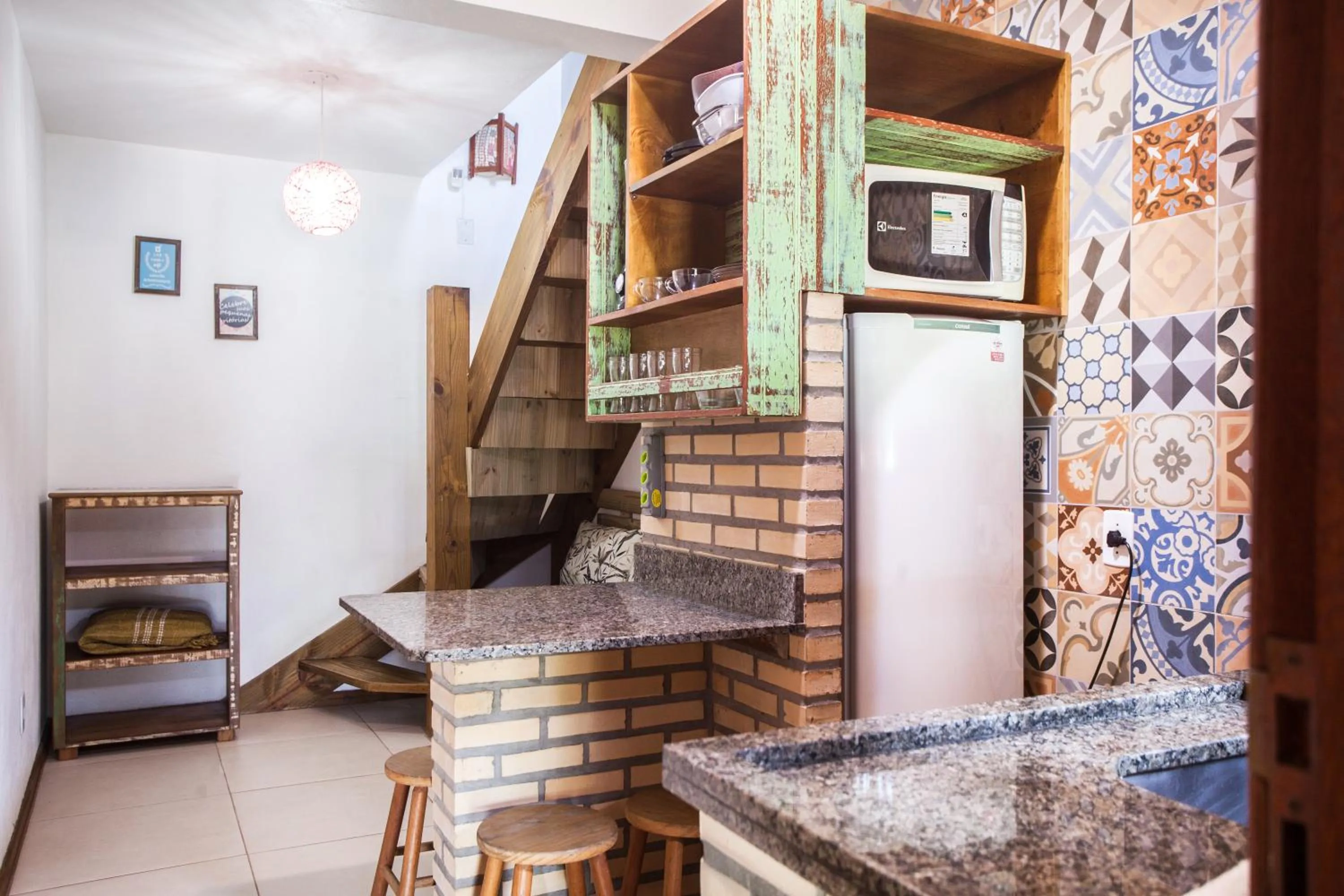 Kitchen or kitchenette in Pousada Cabanas Kaia Lua