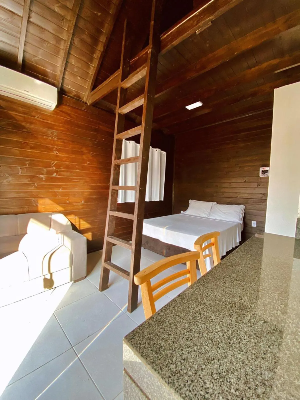 Bed in Pousada Cabanas Kaia Lua