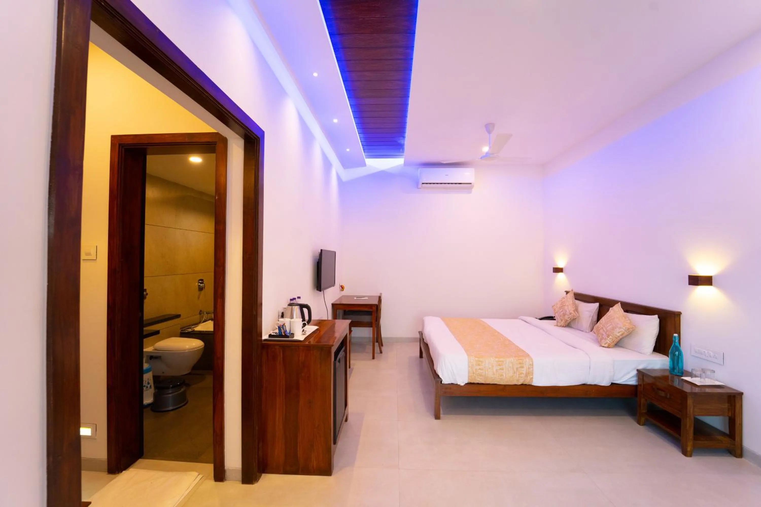 Bed in La Serene Resort and Spa