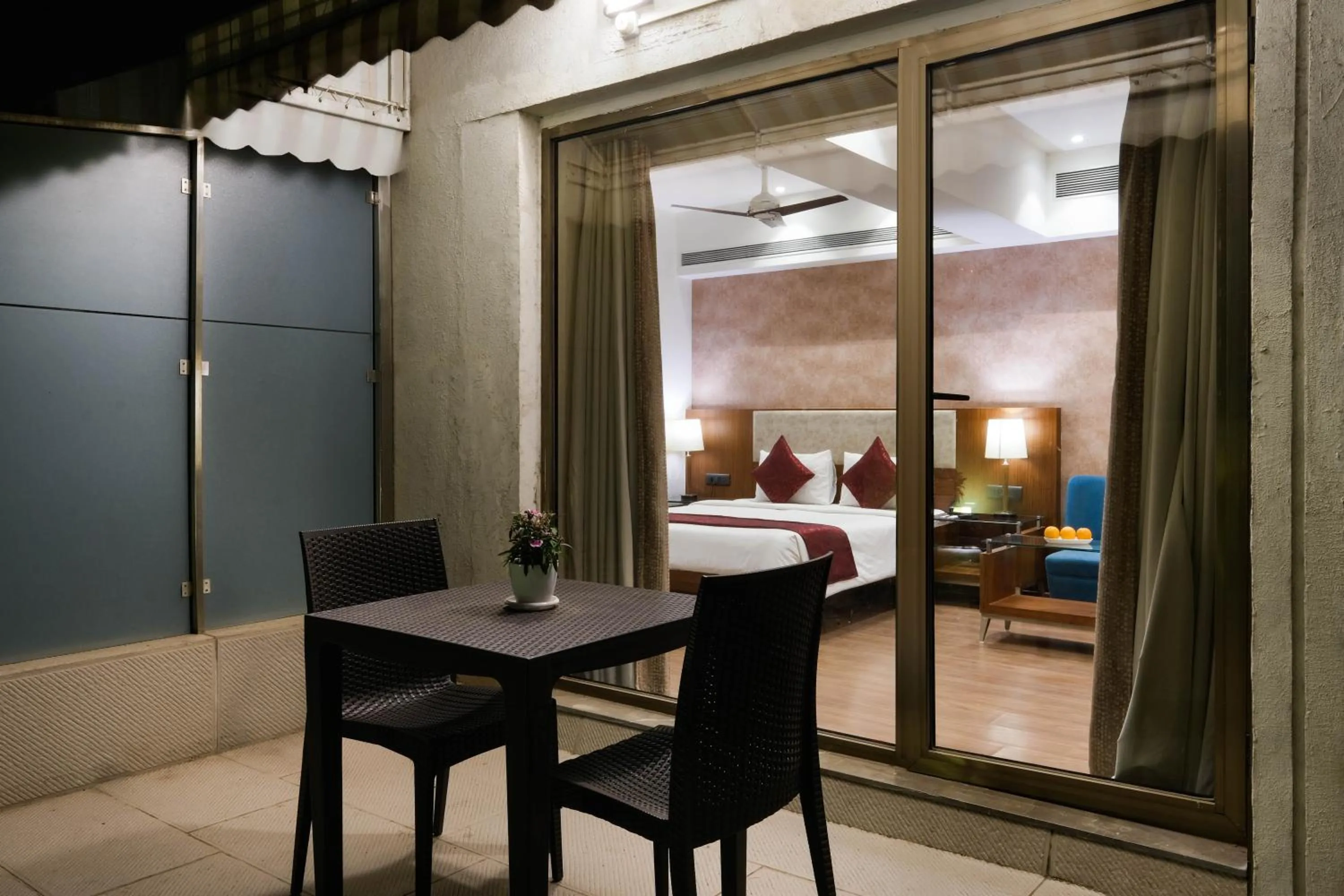 Patio, Bed in 7 Apple Hotel - Viman Nagar Pune