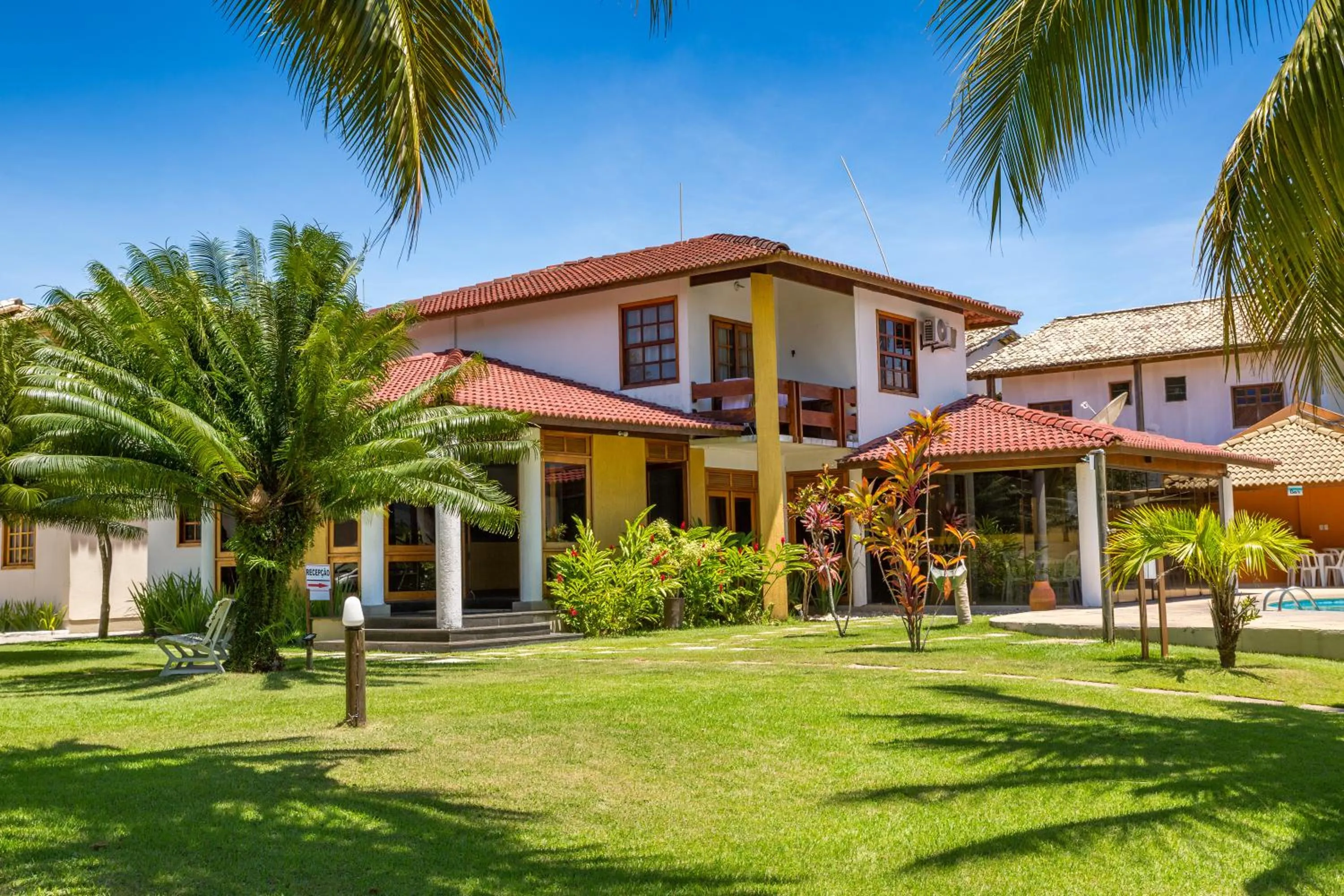 Property building in America Praia Flat - Portal Hotéis