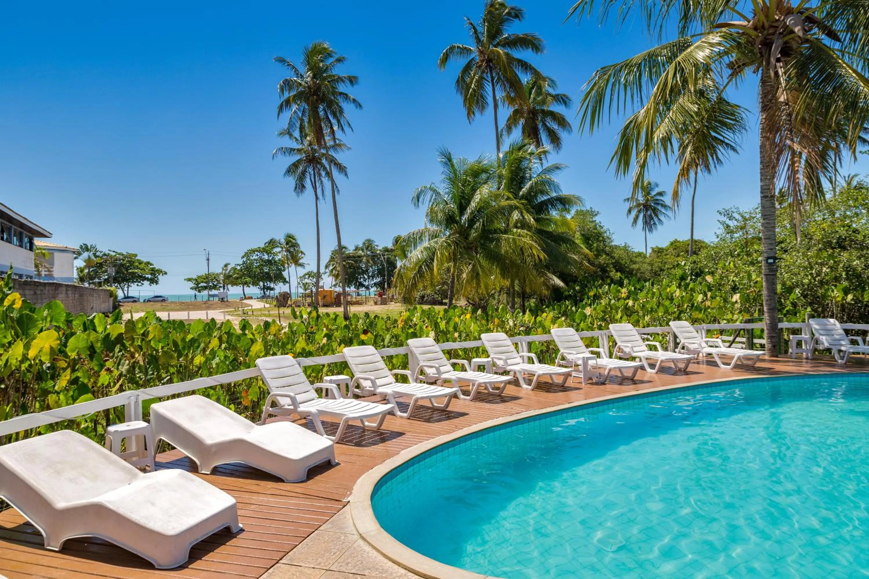 Garden view in America Praia Flat - Portal Hotéis