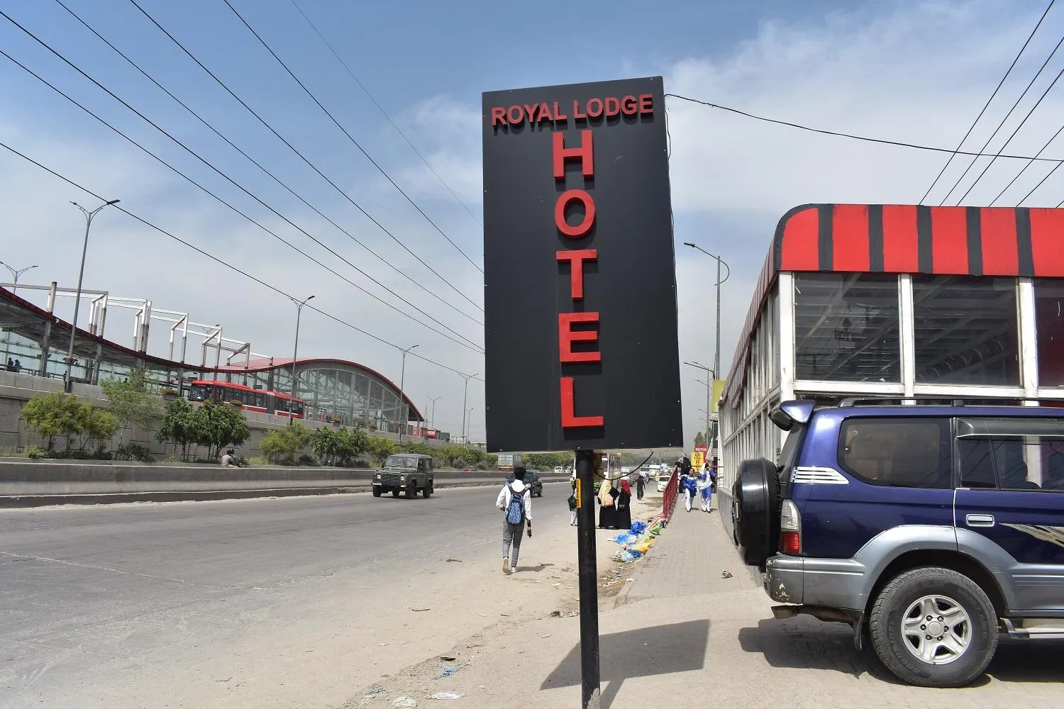 Property logo or sign in Hotel Royal Lodge