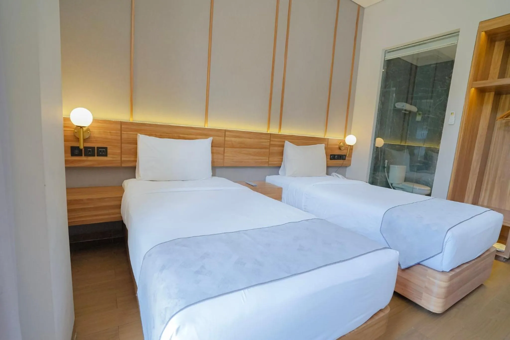 Bed in Facade Hotel by Azana