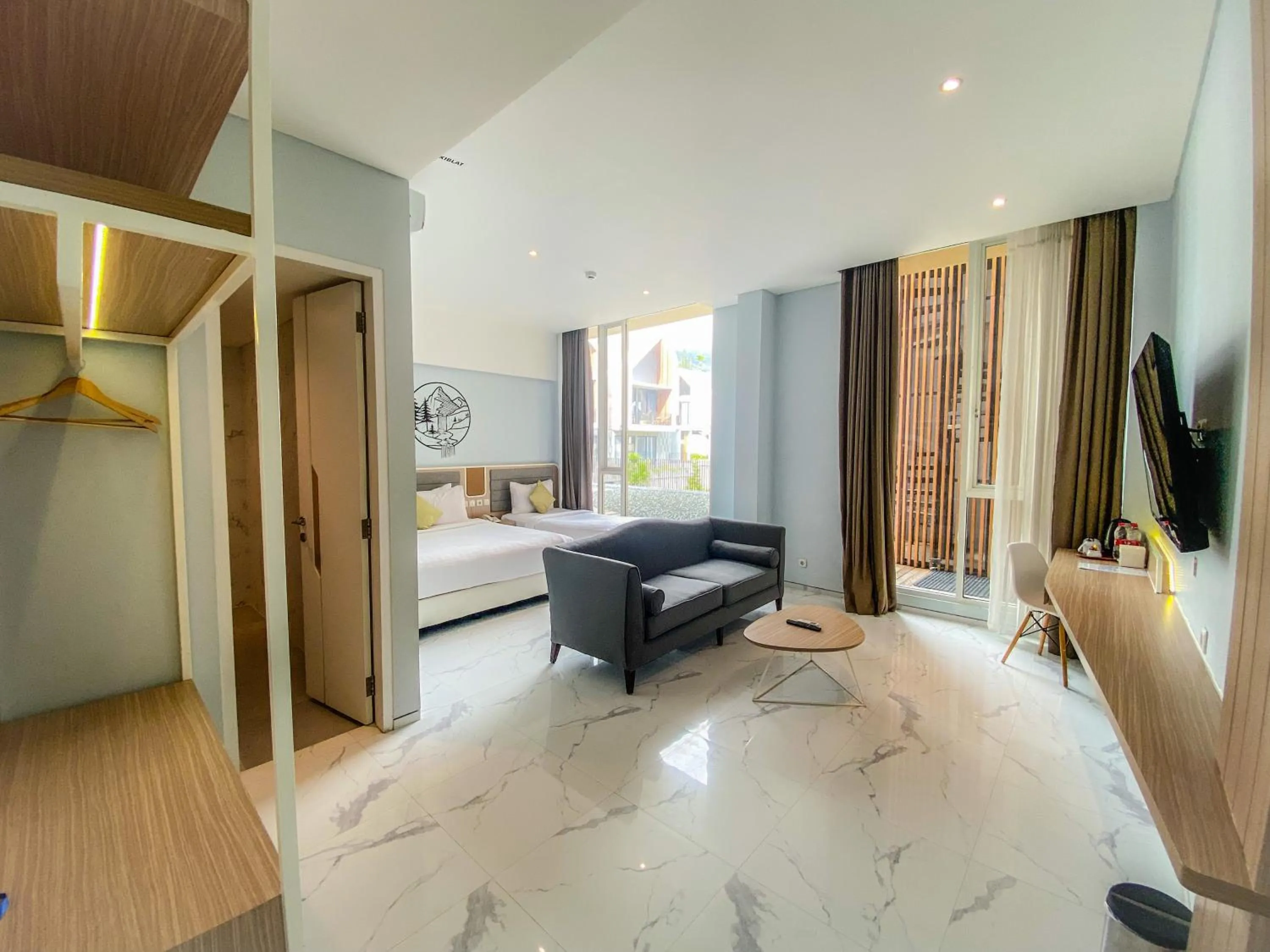 Communal lounge/ TV room, Bed in Facade Hotel by Azana