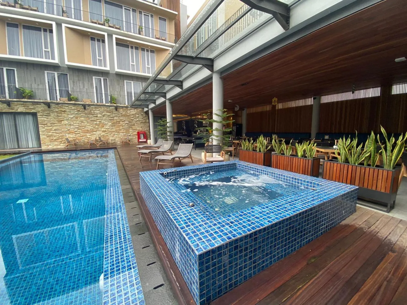 Swimming pool in Facade Hotel by Azana