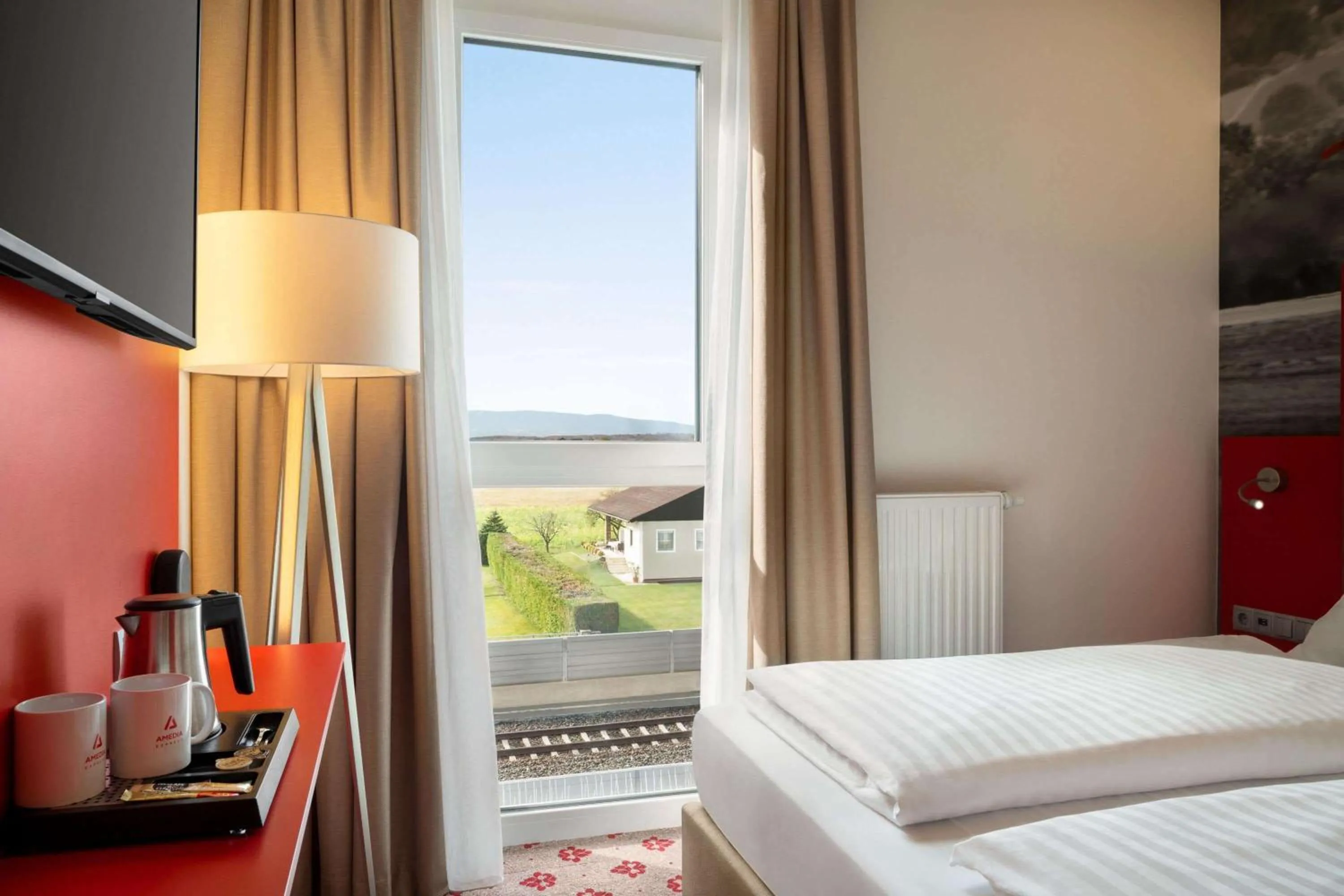 Photo of the whole room, Bed in Amedia Express Graz Airport, Trademark Collection by Wyndham