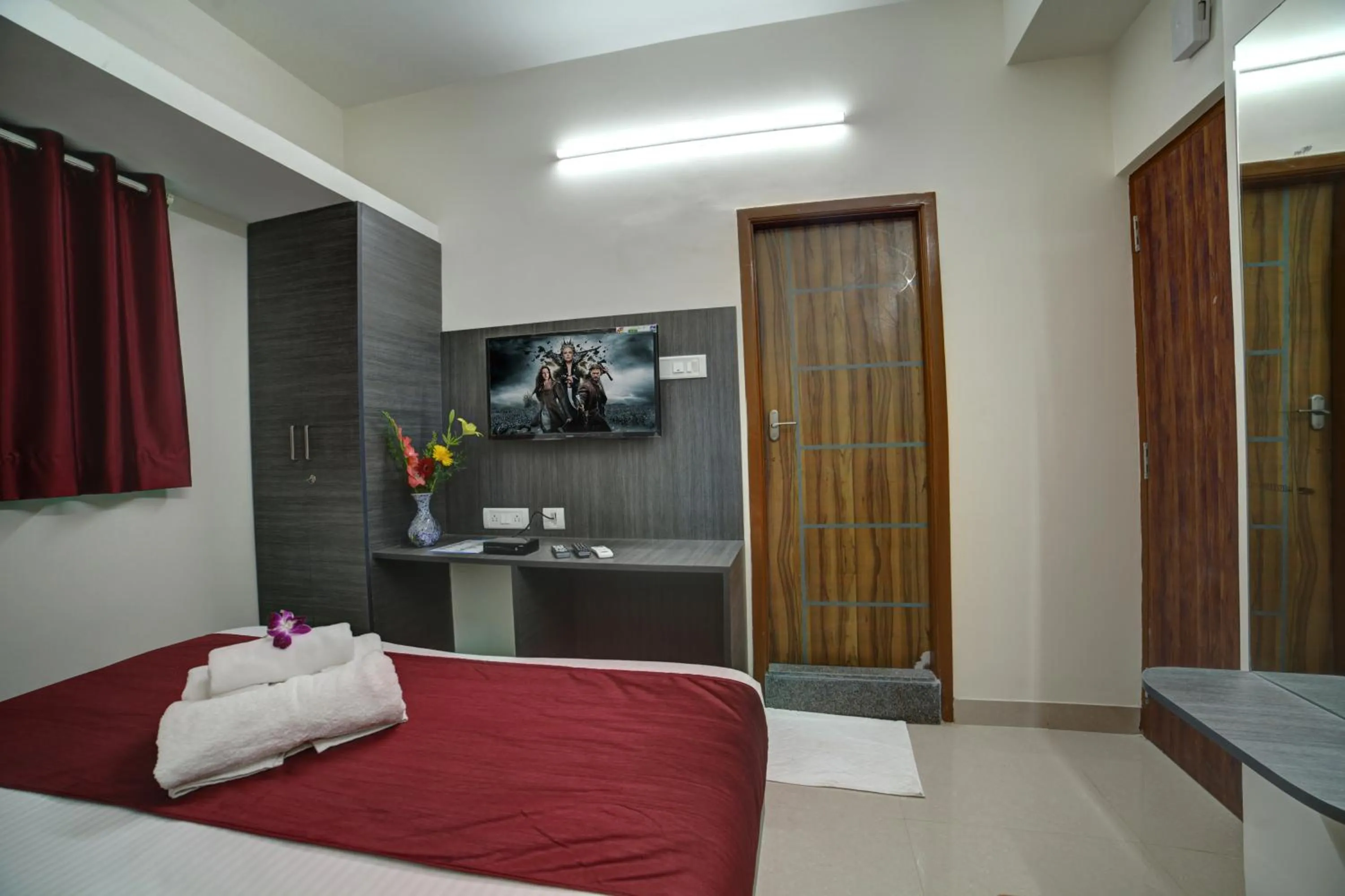 Bedroom, Bed in SM Royal Suites - Hotel near Kempegowda international Airport Bangalore