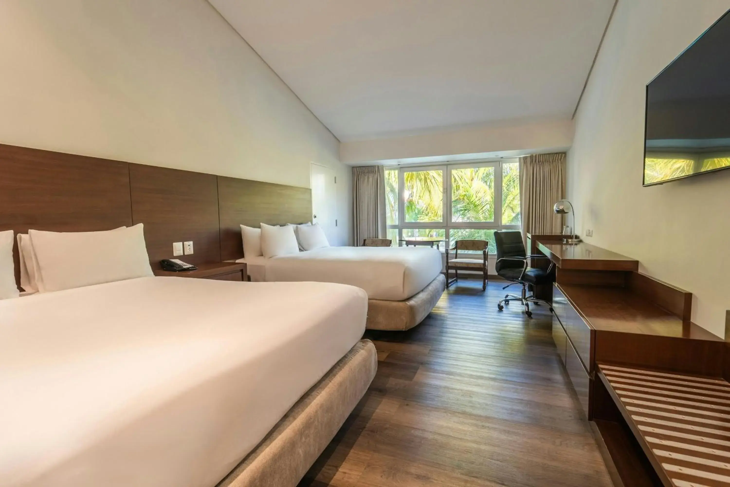 Queen Room with Two Queen Beds and Pool View in Los Tajibos, Santa Cruz de la Sierra, a Tribute Portfolio Hotel Queen Room with Two Queen Beds and Pool View in Los Tajibos, Santa Cruz de la Sierra, a Tribute Portfolio Hotel