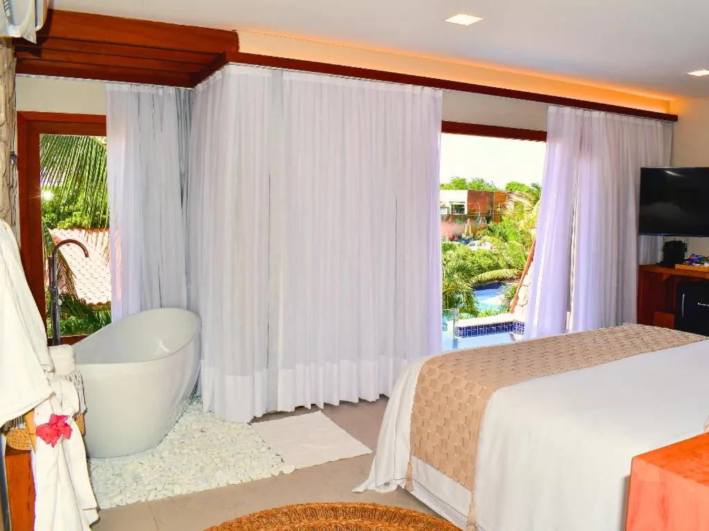 Bed in Pousada Sol e Mar