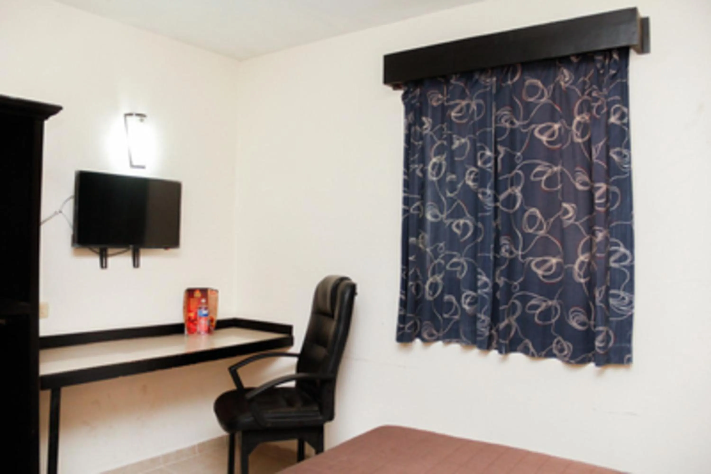 Seating area in Maxihotel Business Class Culiacan