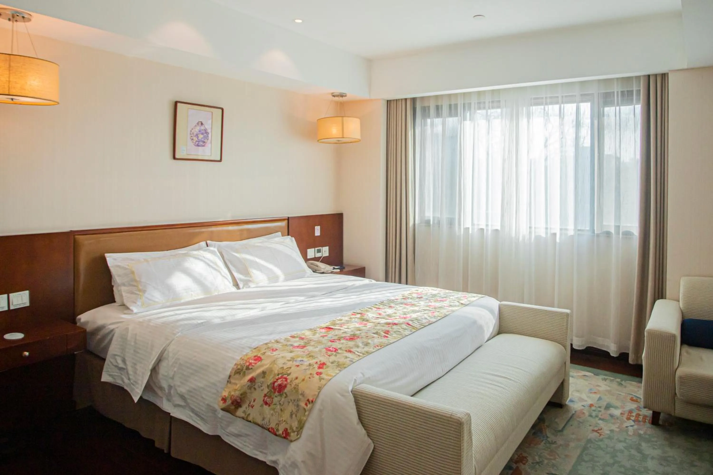 Bed in Jade Garden Hotel