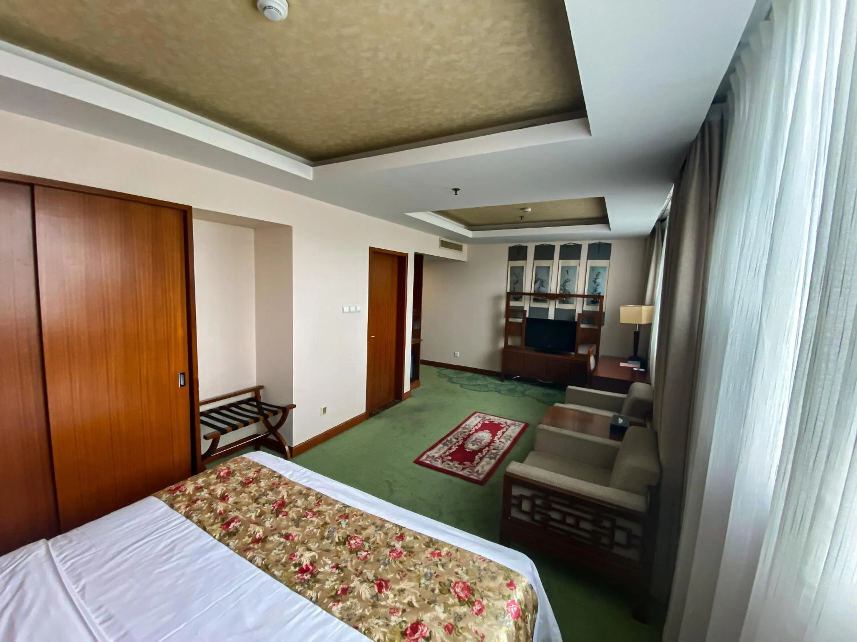 Photo of the whole room, Bed in Jade Garden Hotel