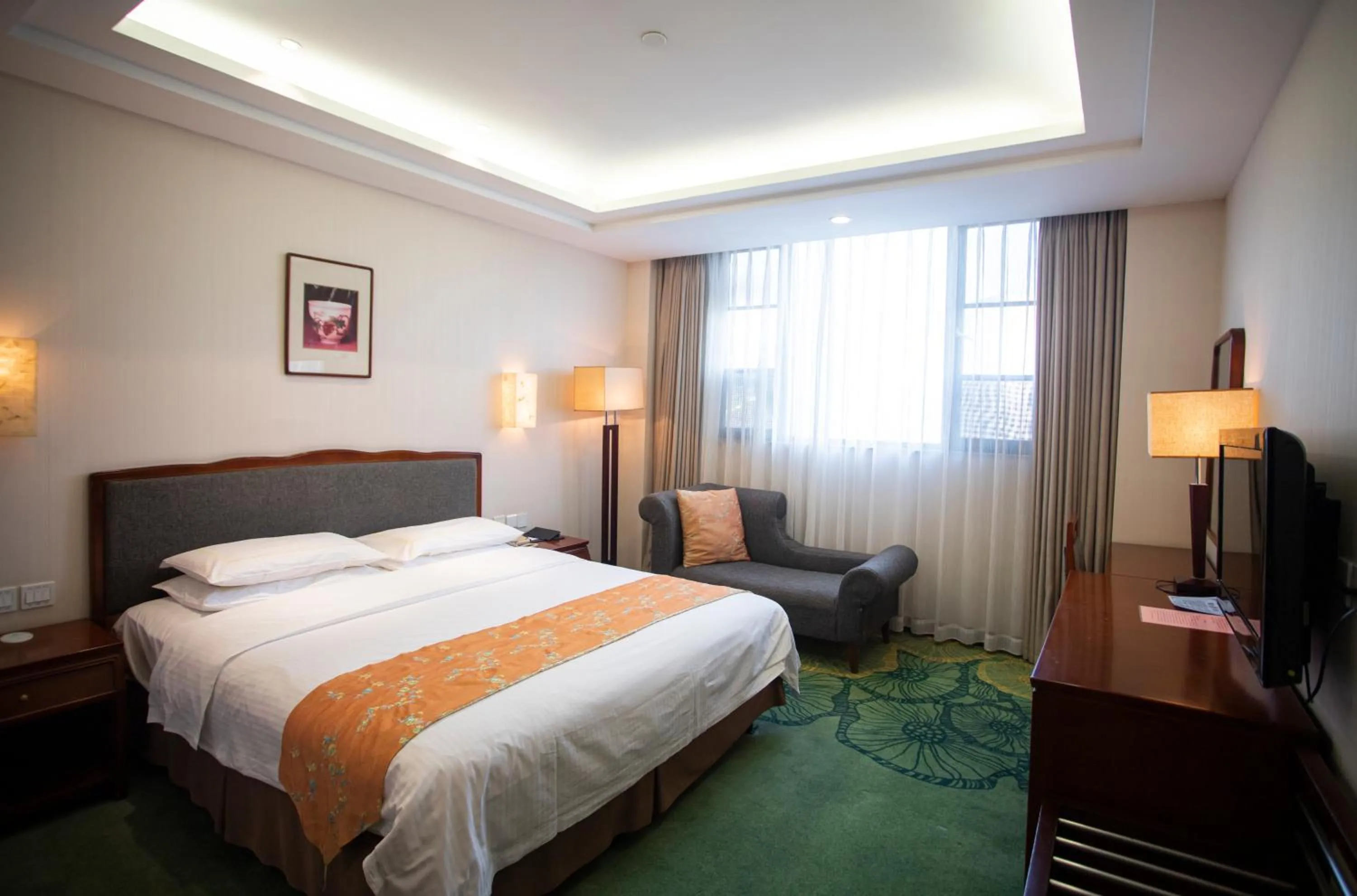 Photo of the whole room, Bed in Jade Garden Hotel