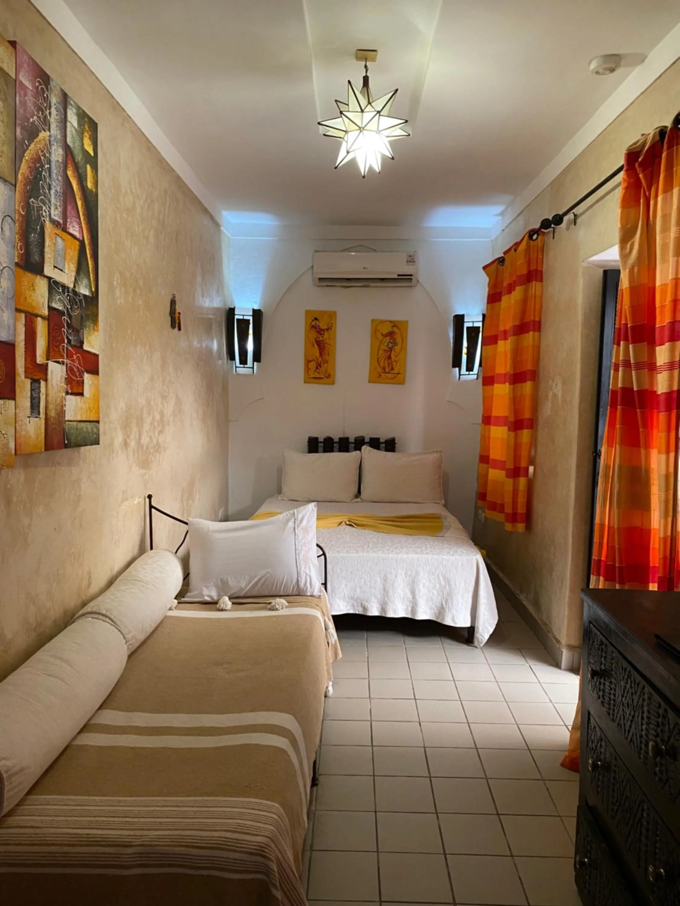 Bed in Riad Le Bel Oranger