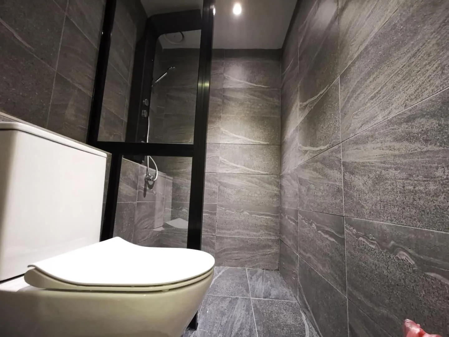 Shower in Oikos Poshtel