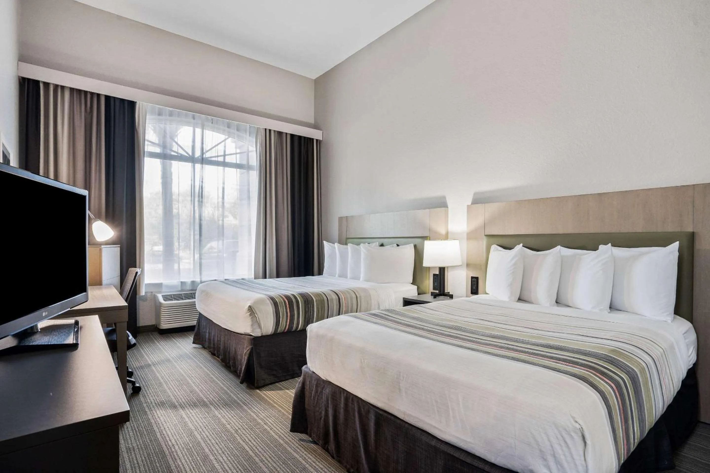 Bedroom, Bed in Country Inn & Suites by Radisson, Port Canaveral, FL