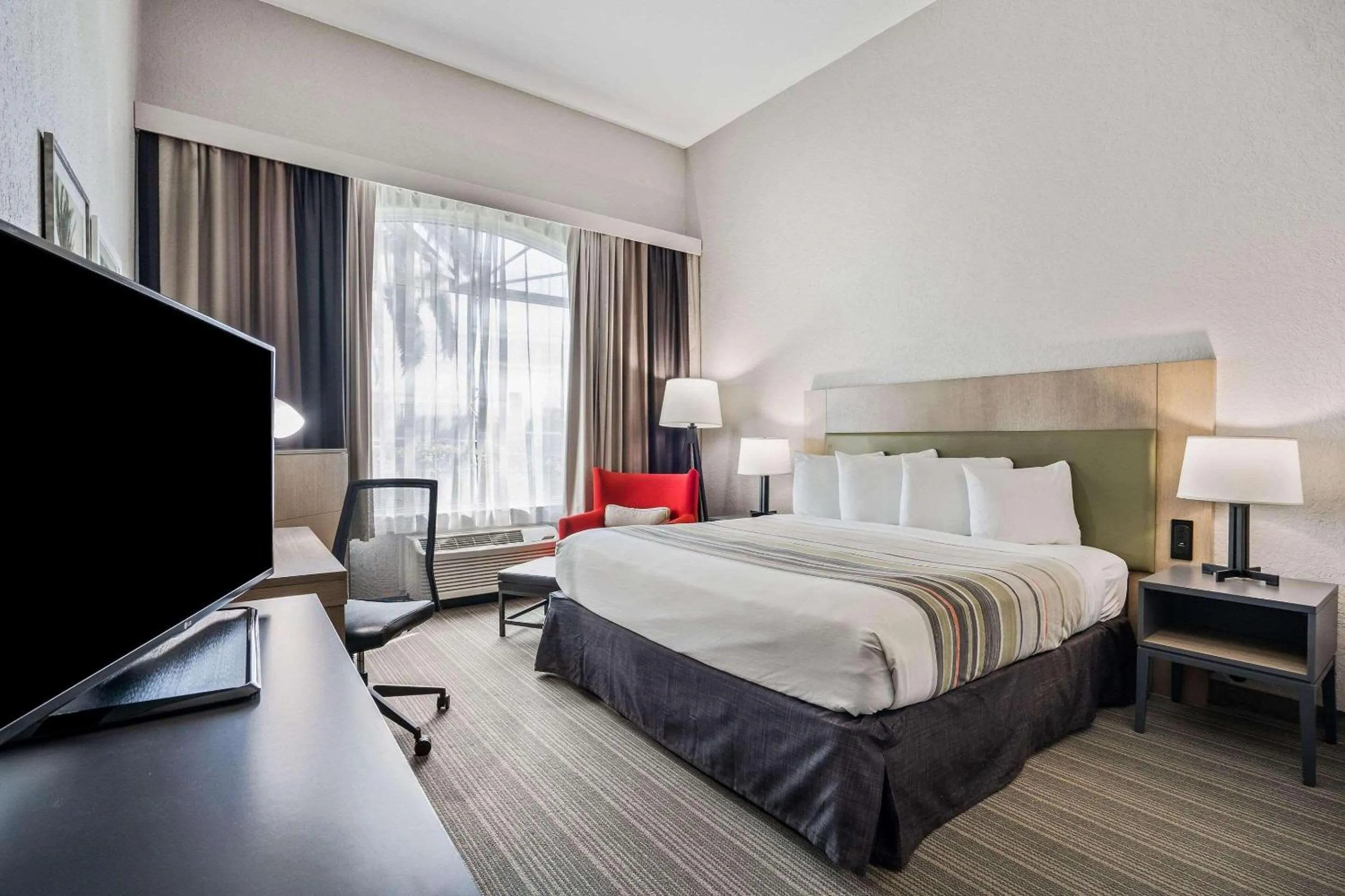 Bedroom, Bed in Country Inn & Suites by Radisson, Port Canaveral, FL