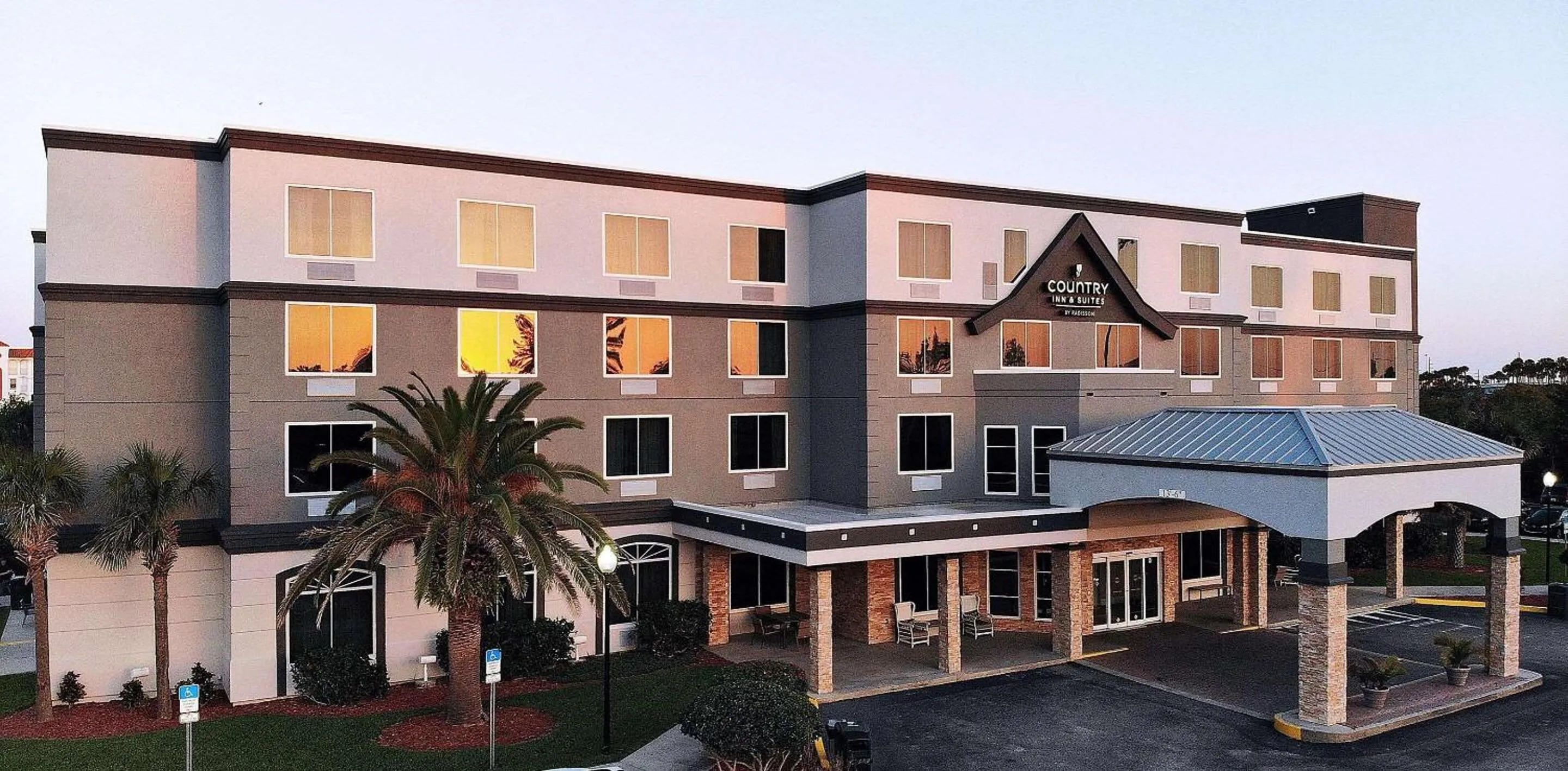 Property building in Country Inn & Suites by Radisson, Port Canaveral, FL