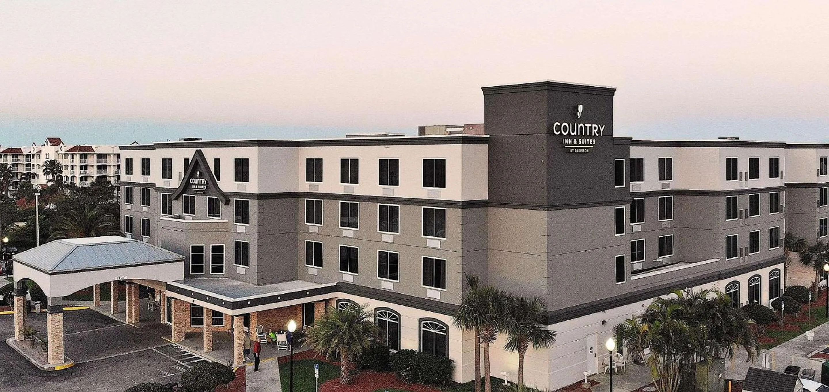 Property building in Country Inn & Suites by Radisson, Port Canaveral, FL
