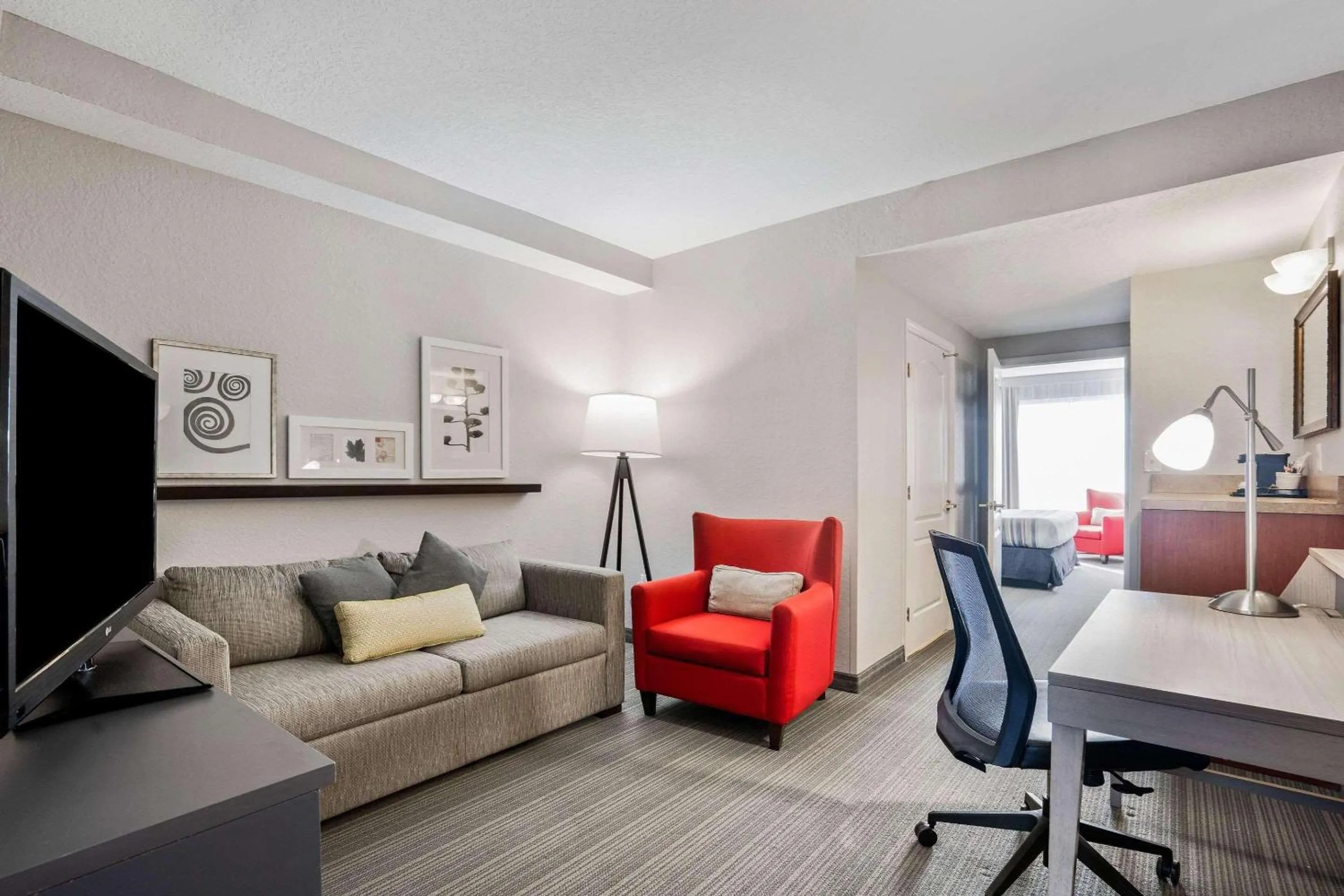 Bedroom in Country Inn & Suites by Radisson, Port Canaveral, FL