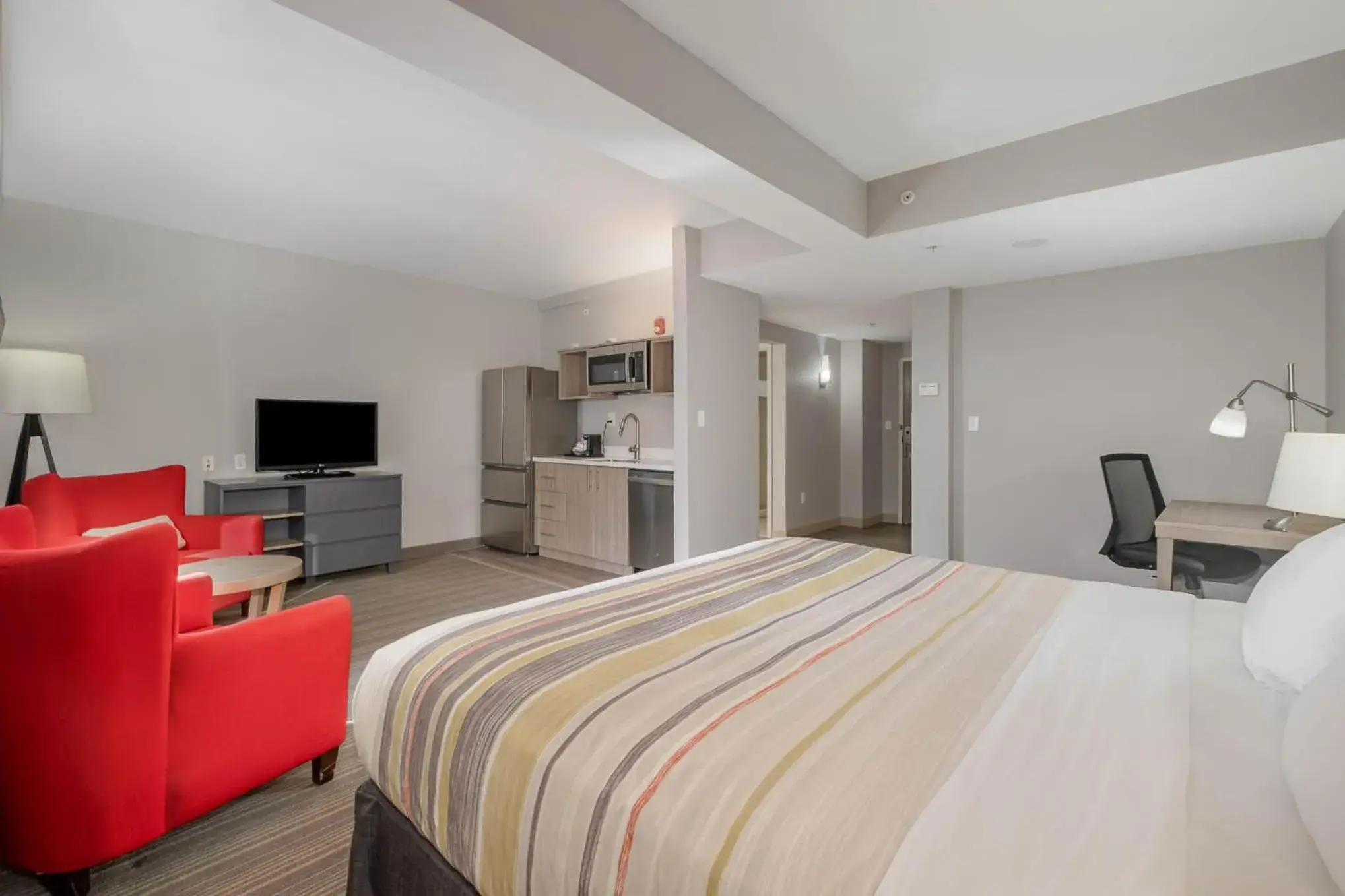 Premium Studio Suite with King Bed - Non-Smoking in Country Inn & Suites by Radisson, Port Canaveral, FL Premium Studio Suite with King Bed - Non-Smoking in Country Inn & Suites by Radisson, Port Canaveral, FL