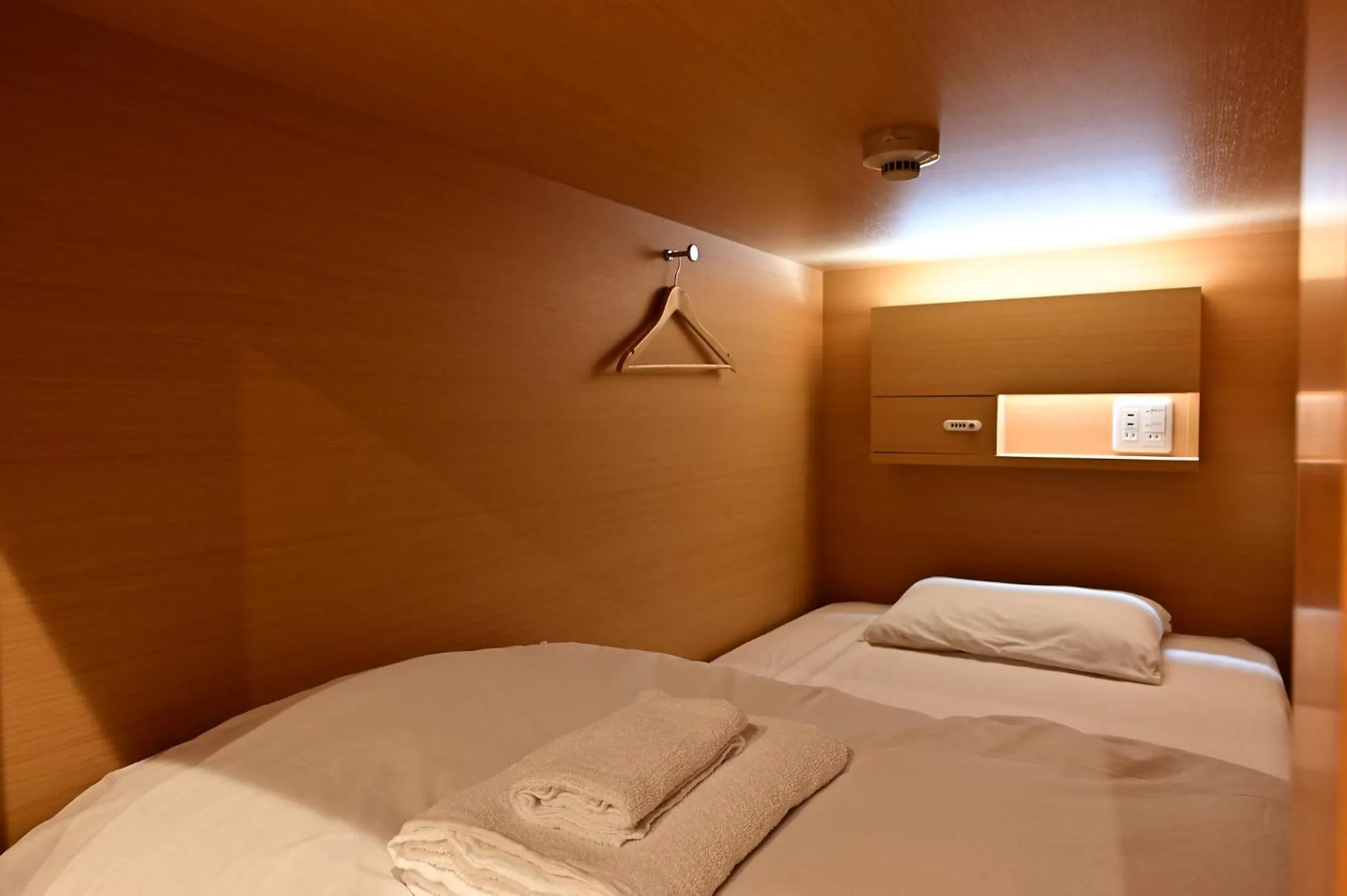 Bed in Hotel Tomariya Ueno