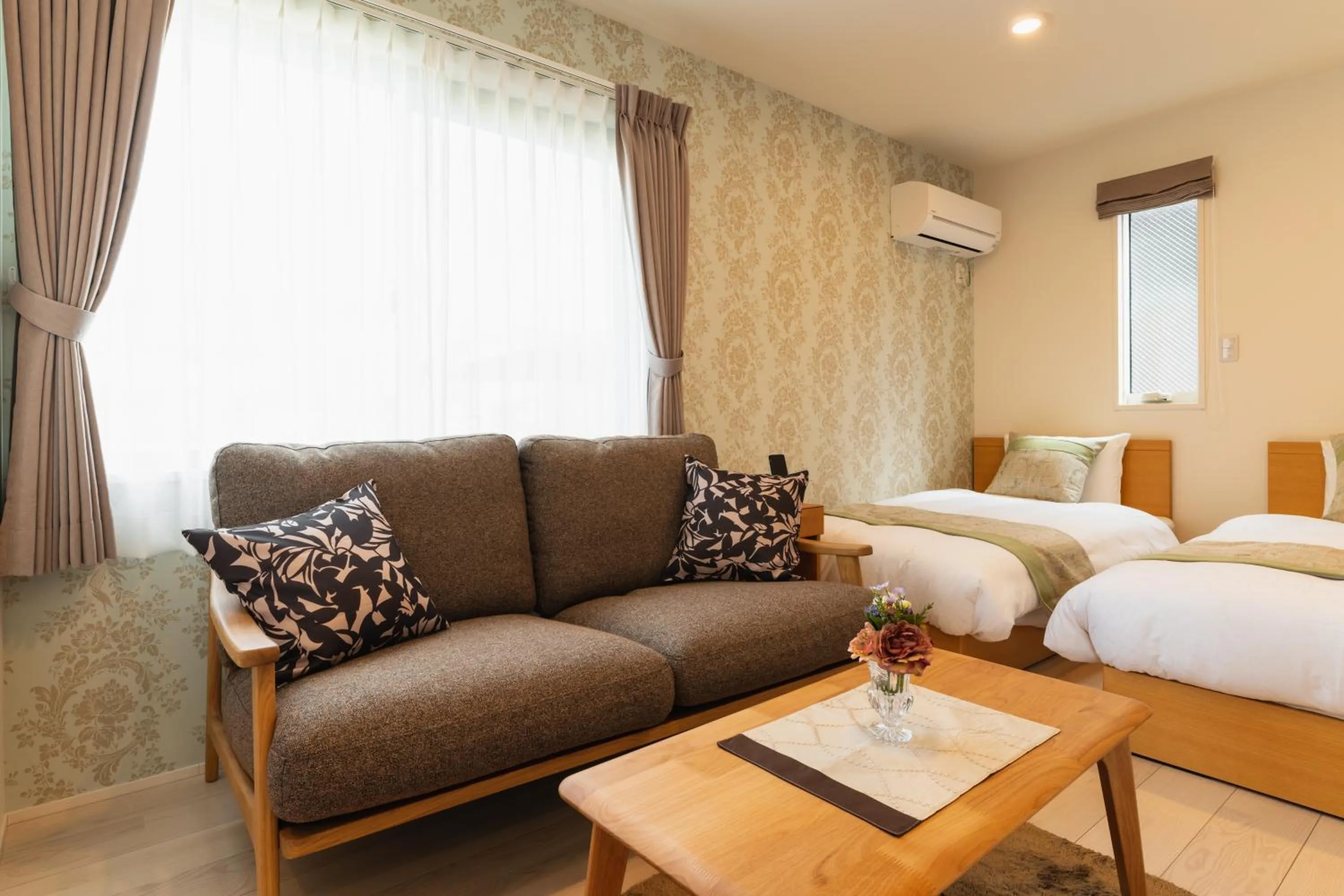Living room, Bed in Ambicia Sasebo