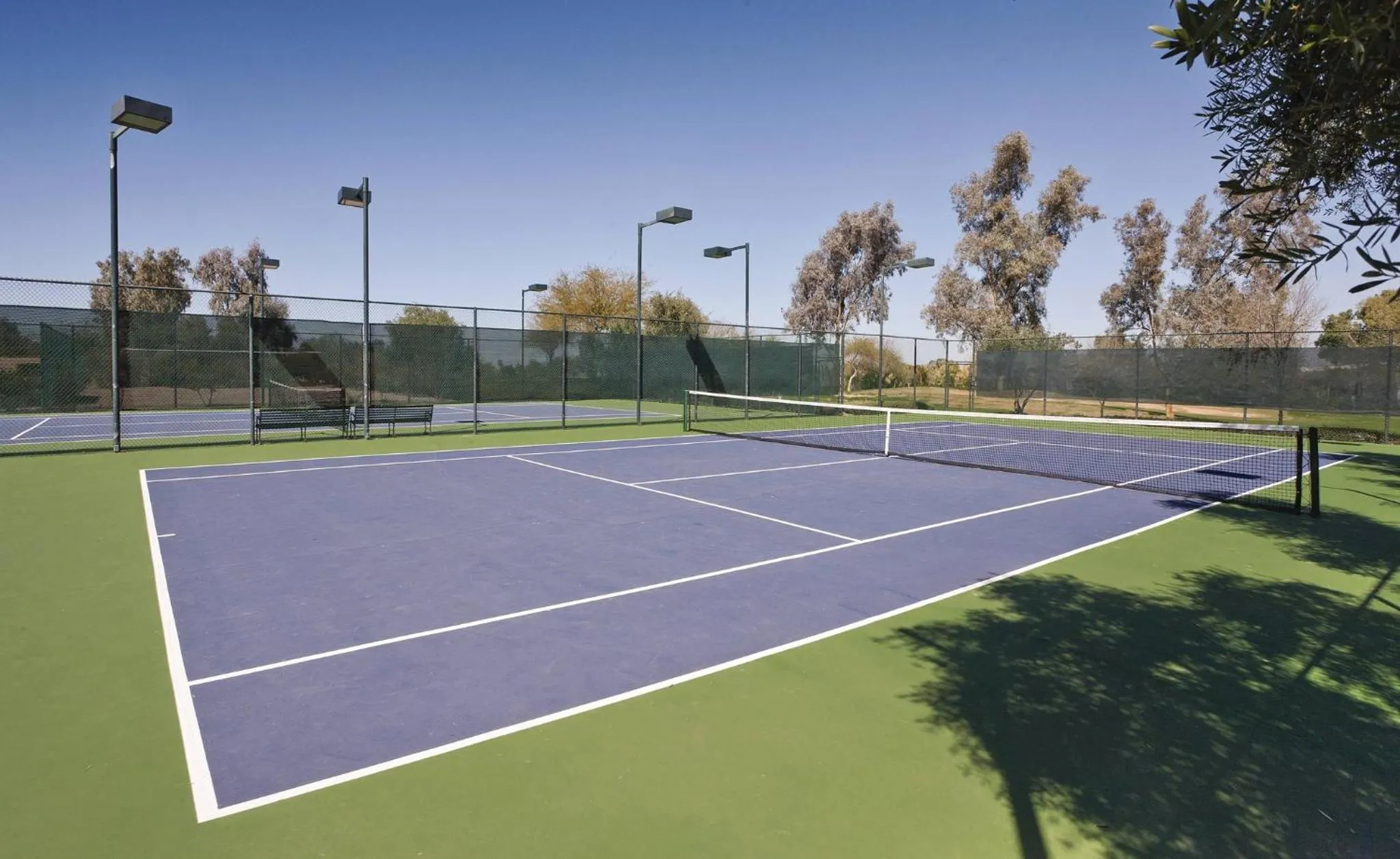 Tennis court in The Legacy Golf Resort