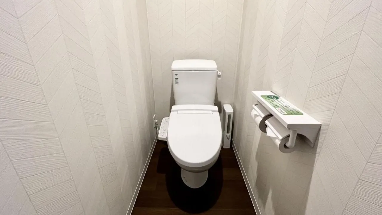 Toilet in Apartment Hotel Ecott