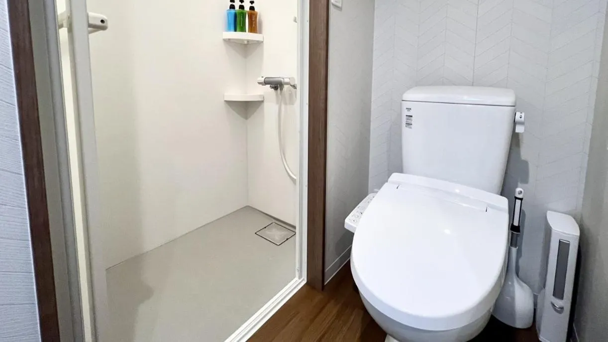 Shower in Apartment Hotel Ecott