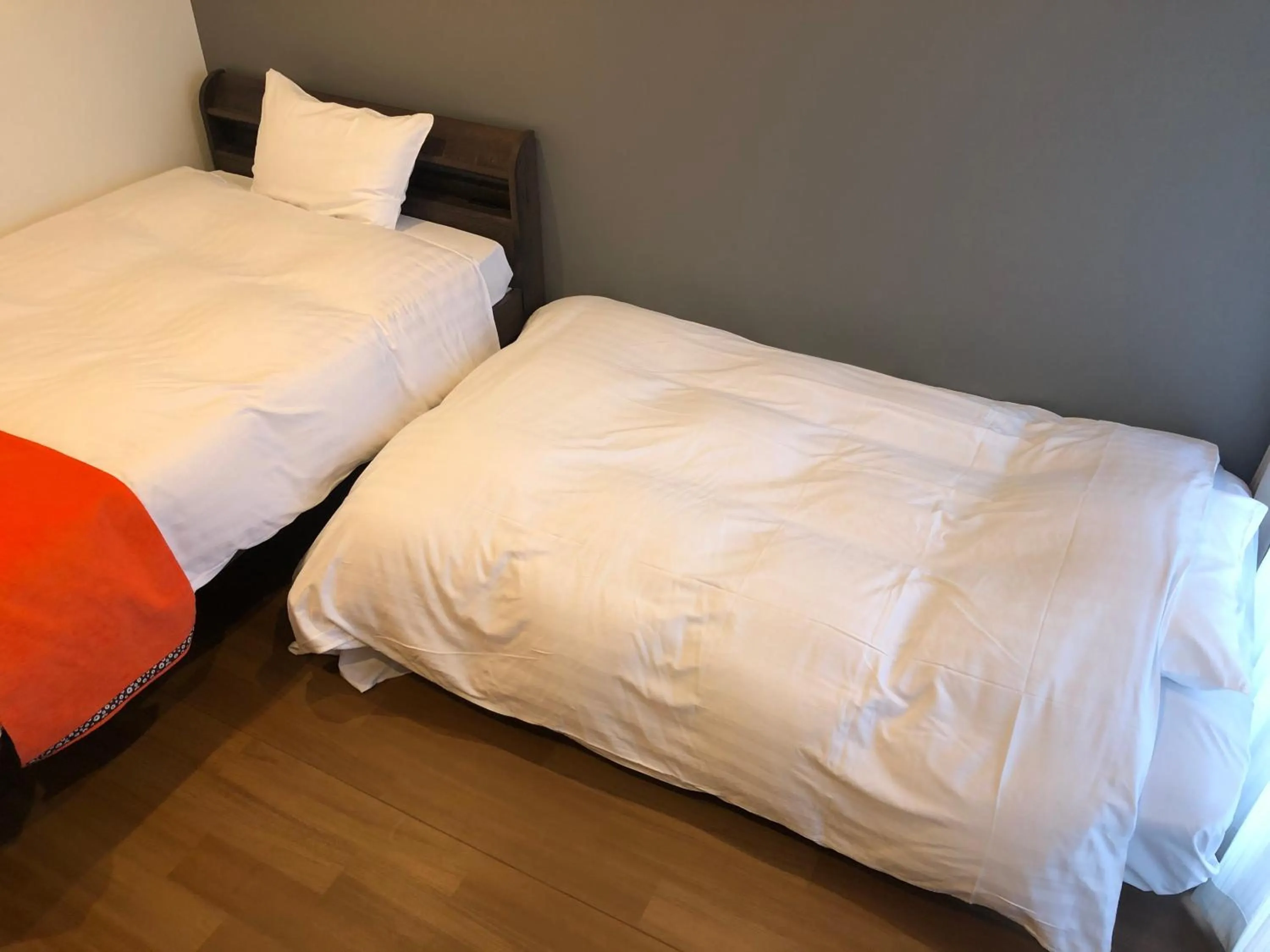 Bed in Apartment Hotel Ecott