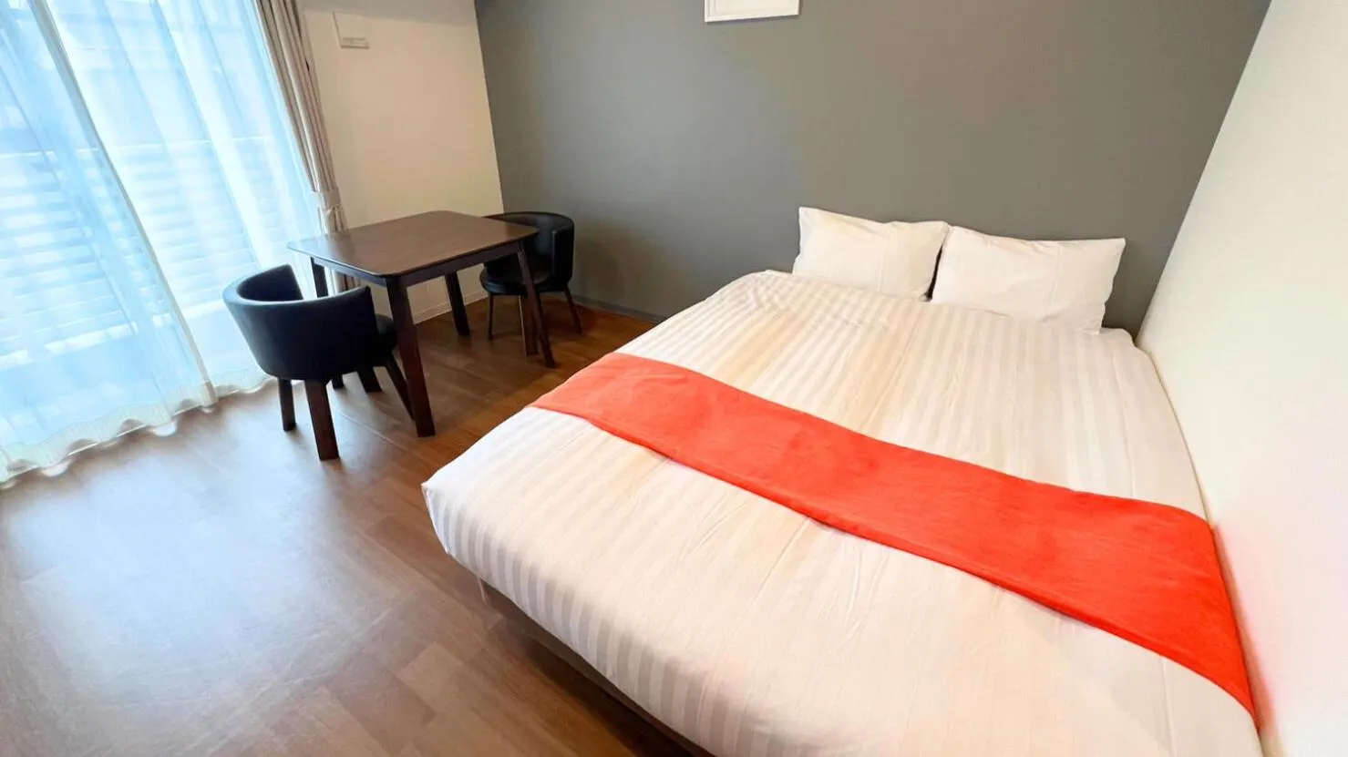 Bed in Apartment Hotel Ecott