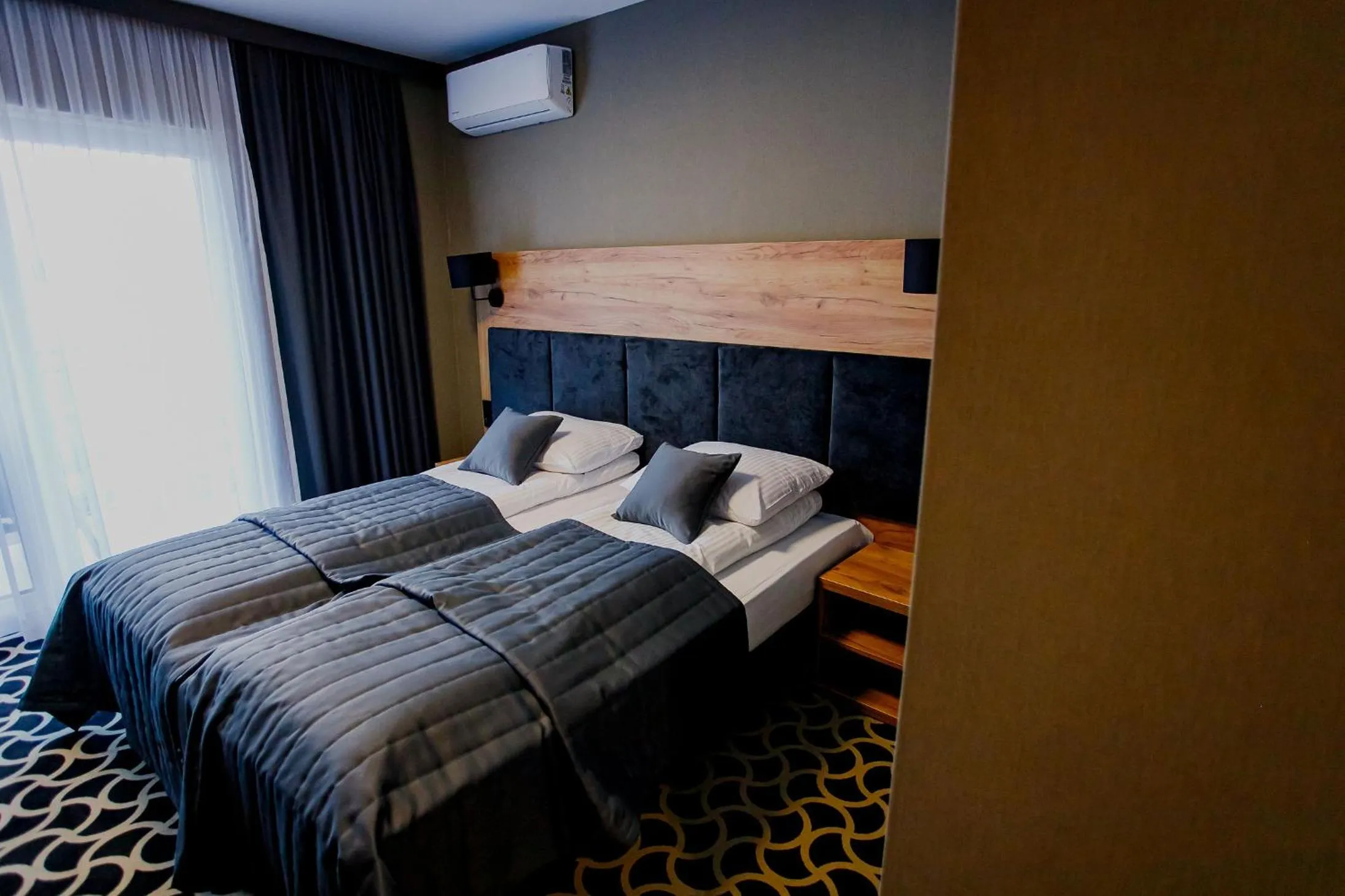 Bed in Hotel Coloseum