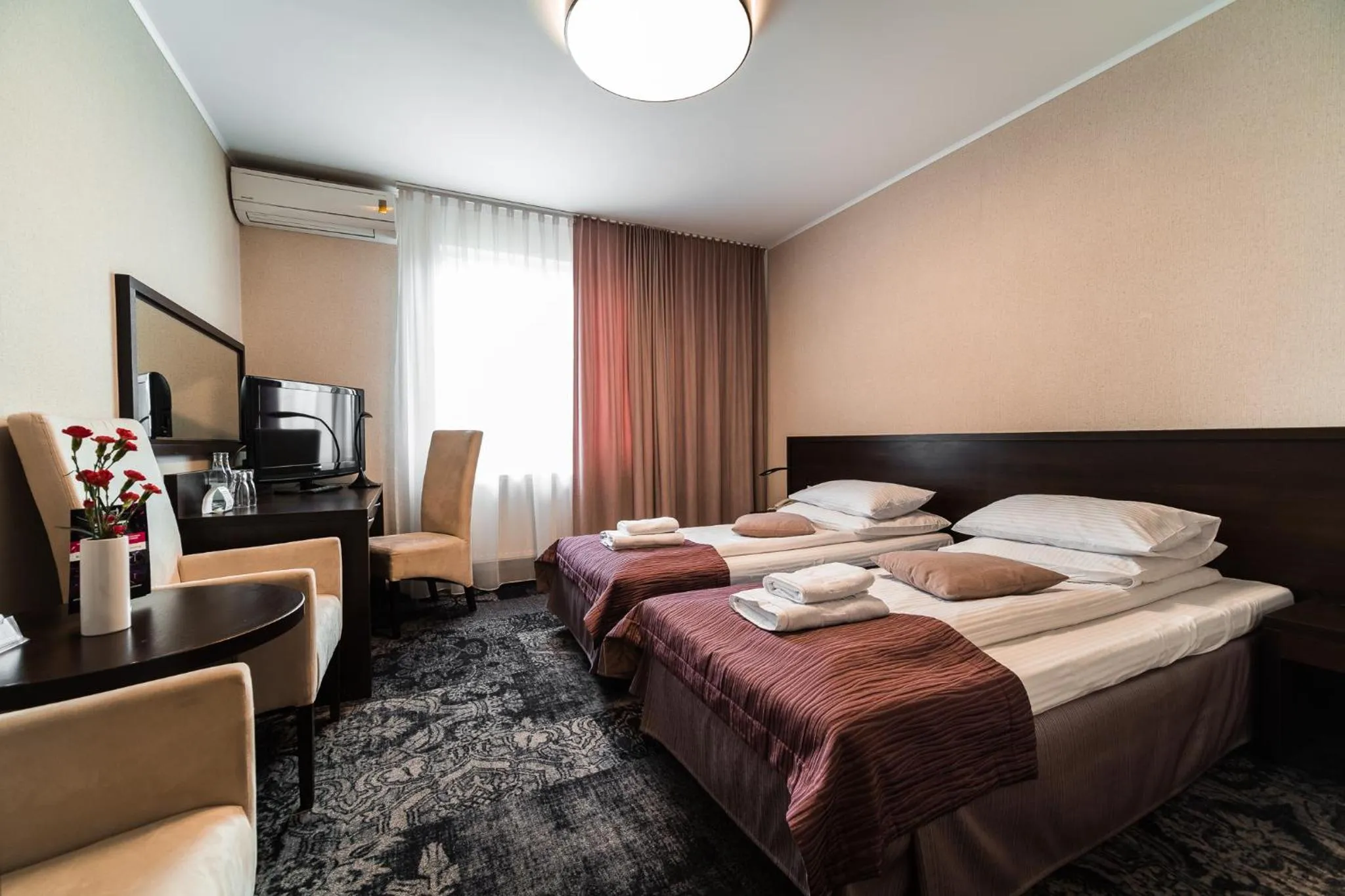 Bed in Hotel Coloseum