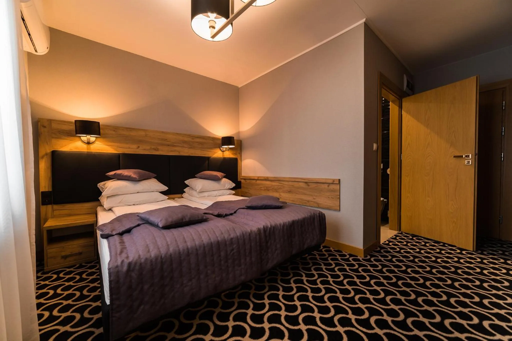 Bed in Hotel Coloseum