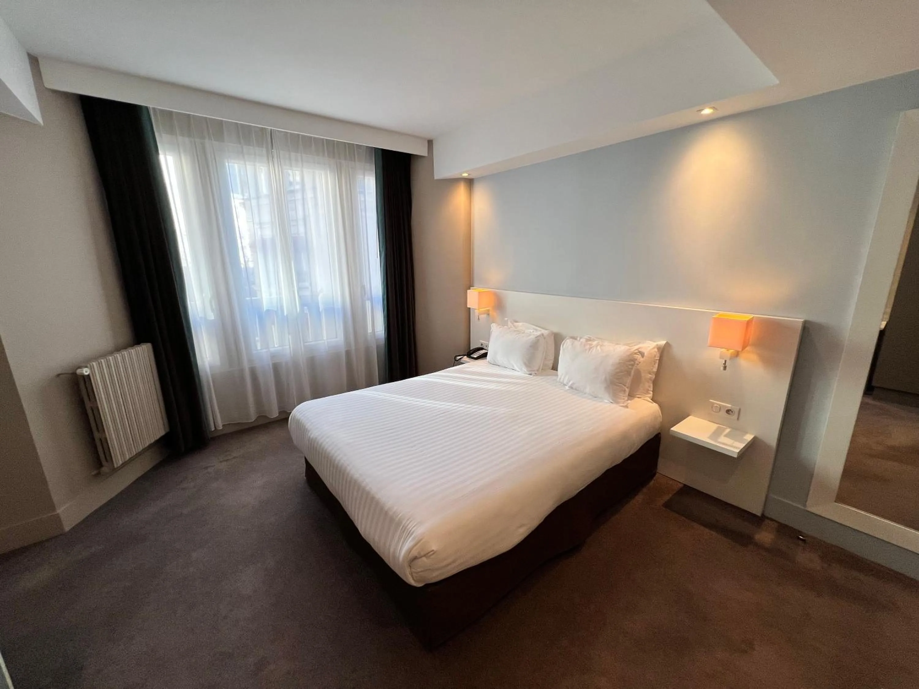 Bed in Holiday Inn Paris-Auteuil by IHG