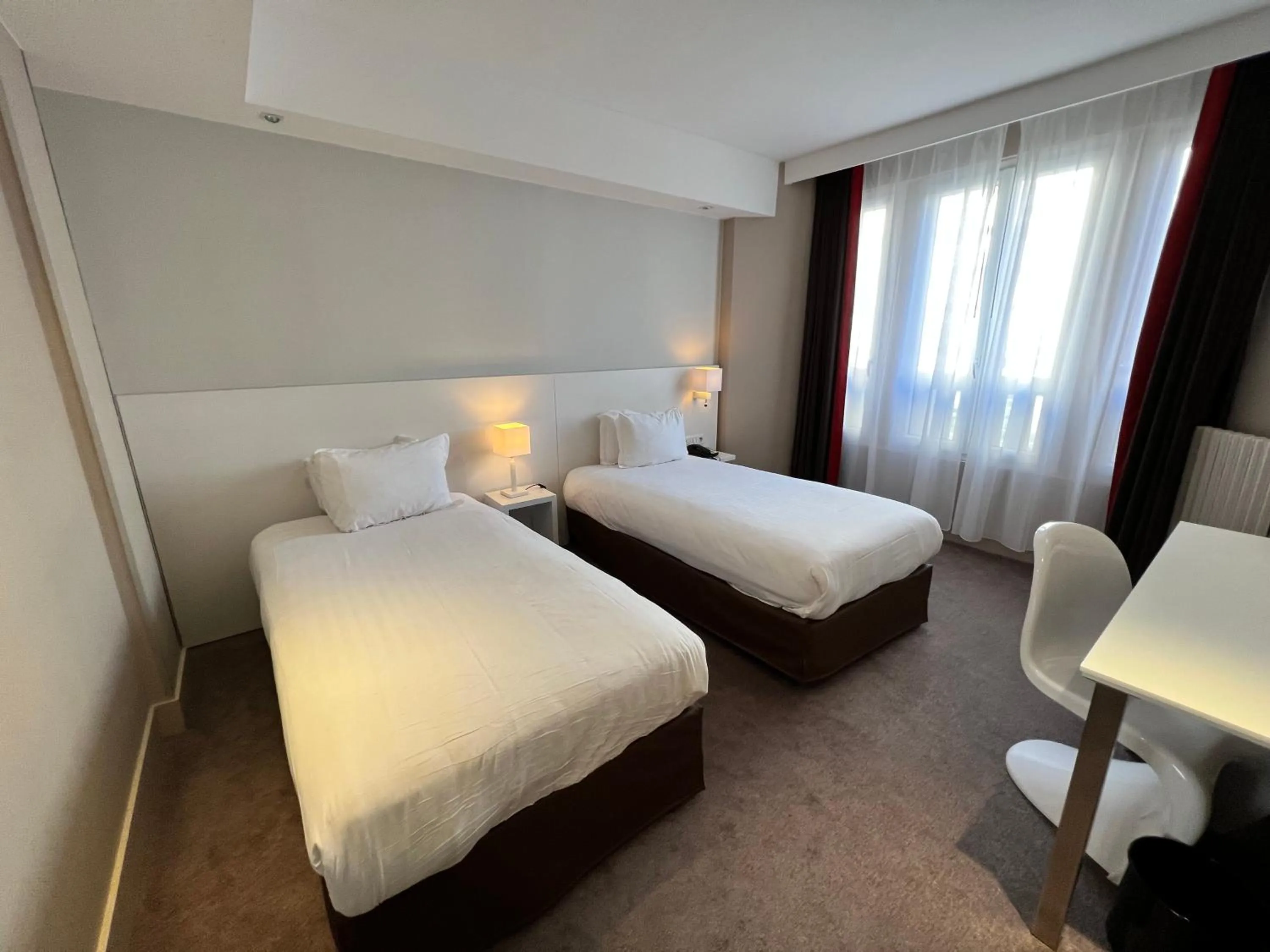 Bed in Holiday Inn Paris-Auteuil by IHG