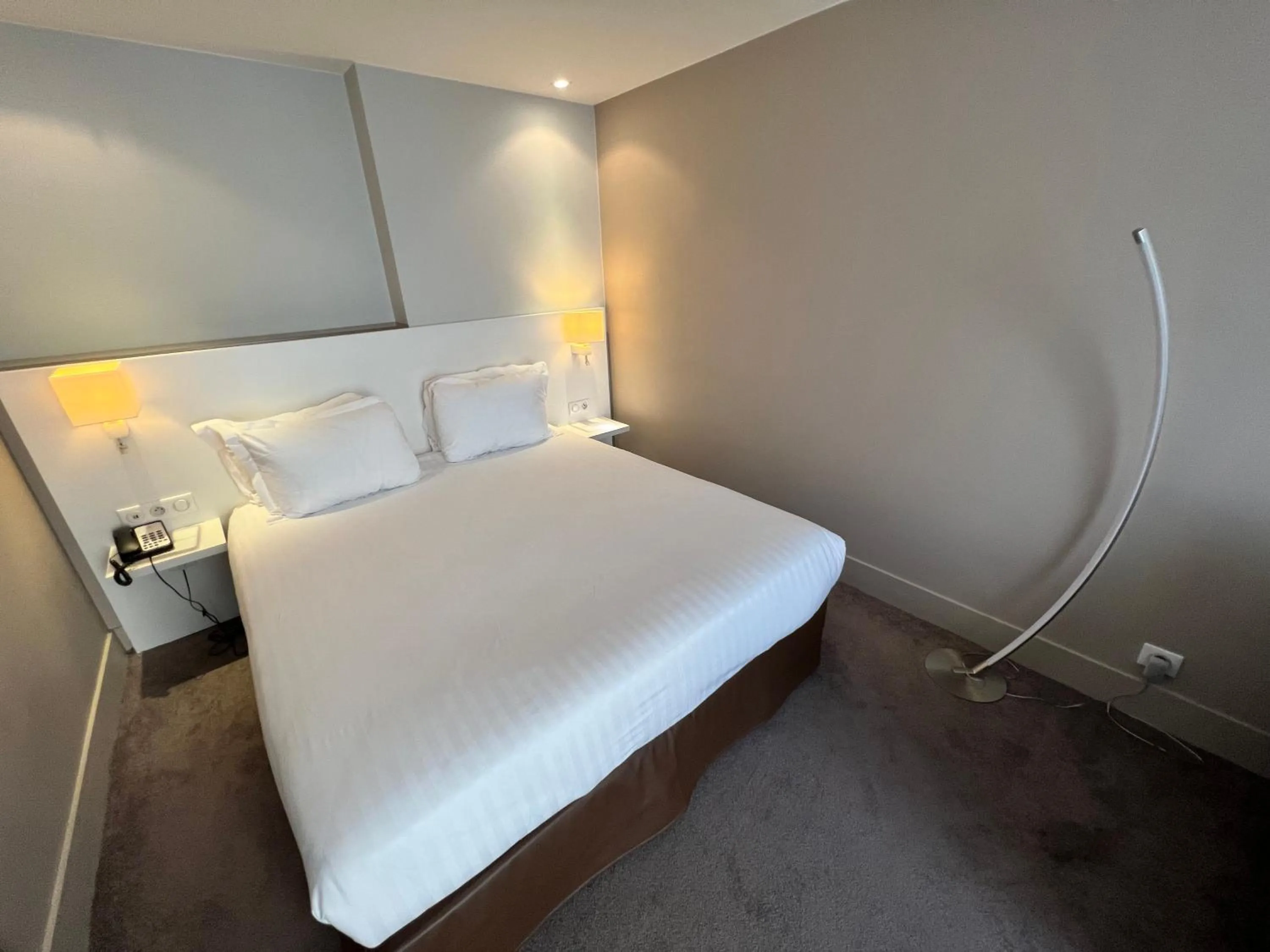 Bed in Holiday Inn Paris-Auteuil by IHG