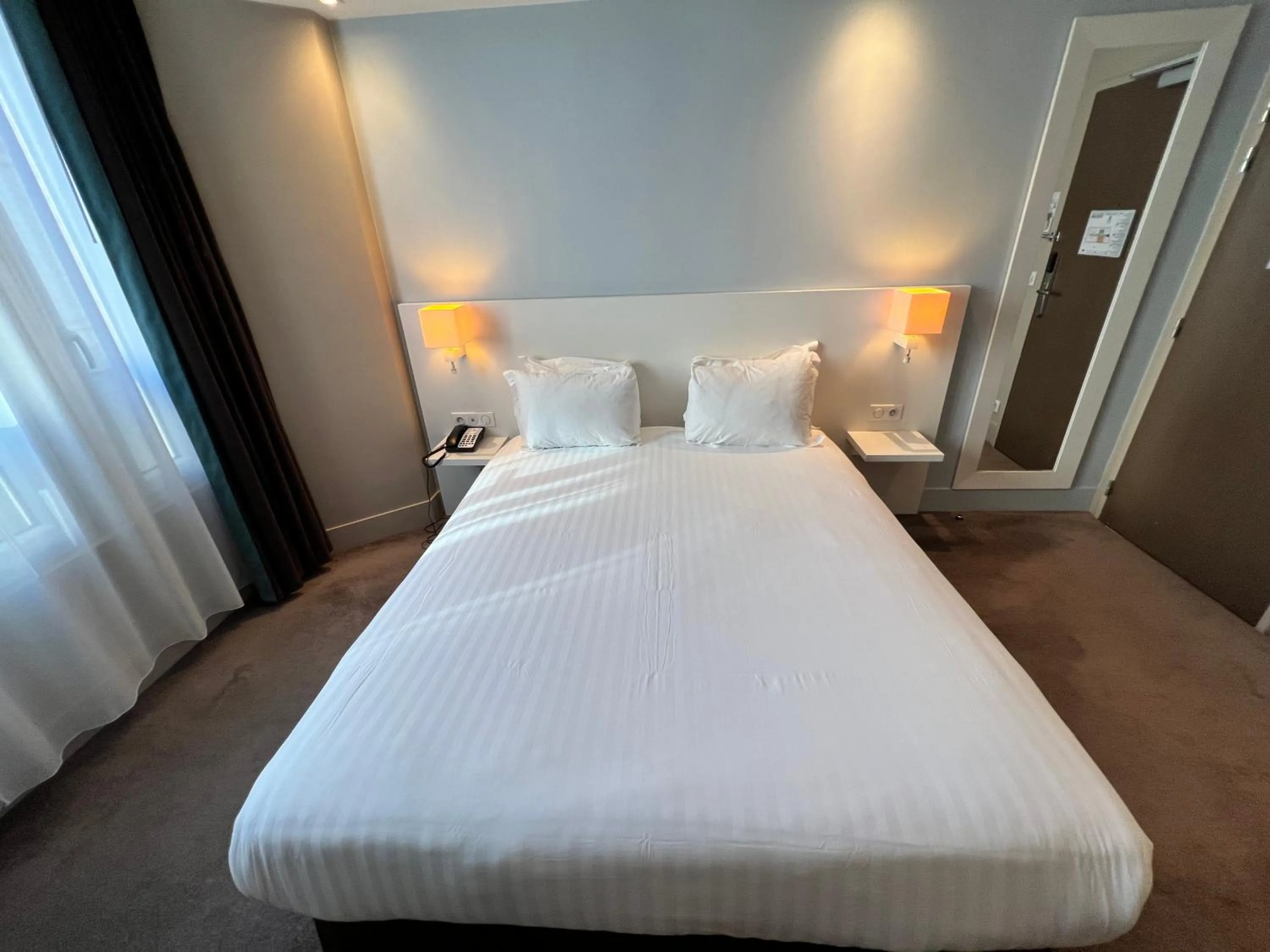 Bed in Holiday Inn Paris-Auteuil by IHG