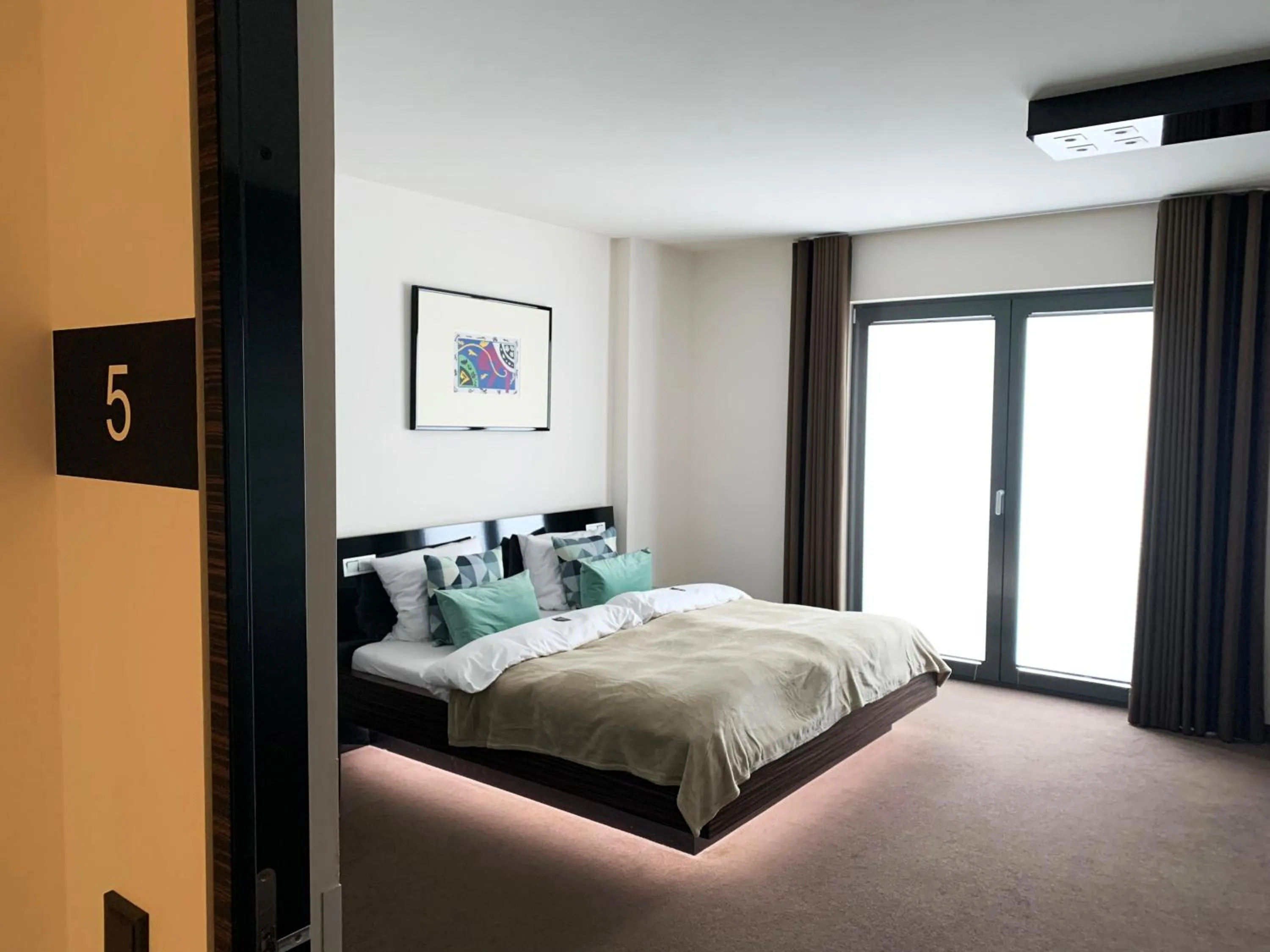 Bed in Hotel im Wigbold