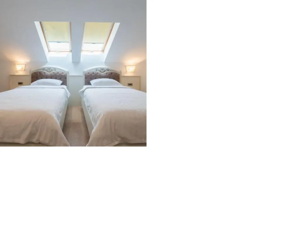 Bed in Hotel Gabriela