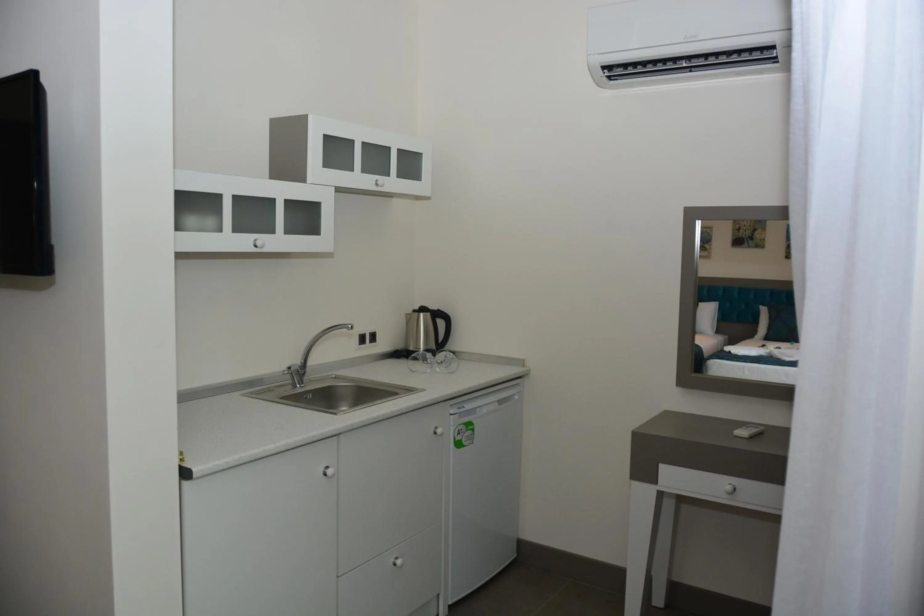 Kitchen or kitchenette in THE NORDİC HOTEL